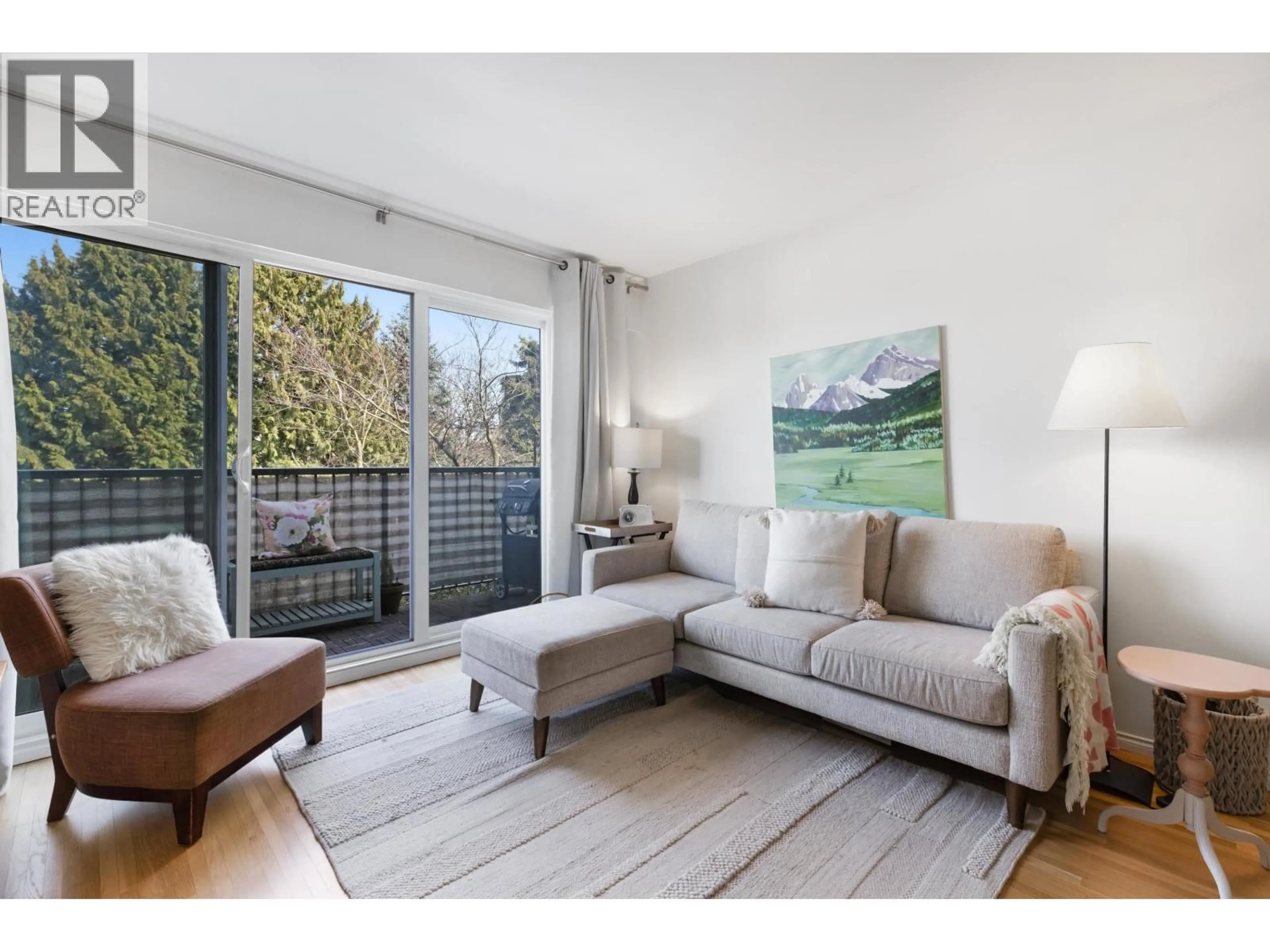 Living room with furniture, wood/laminate floor for 303 - 2125 2ND AVENUE, Vancouver British Columbia V6K1H7