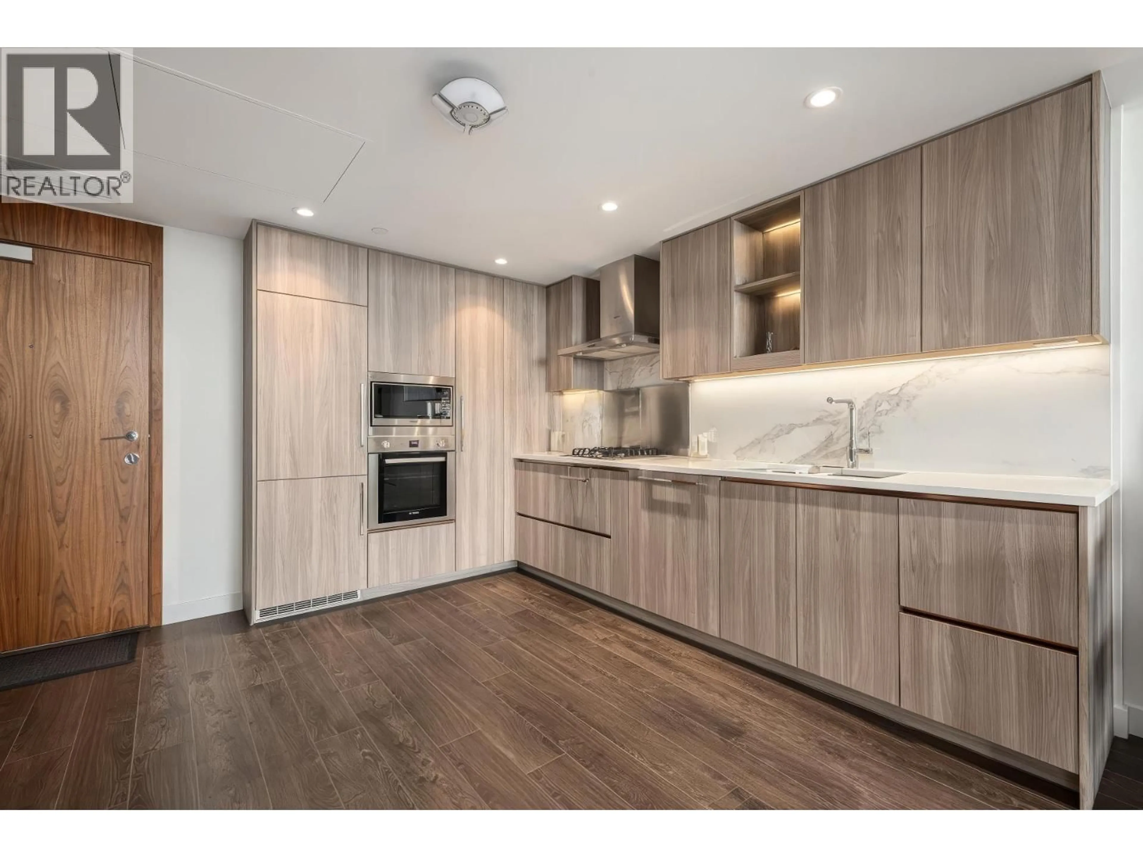 Open concept kitchen, wood/laminate floor for 1306 - 8611 HAZELBRIDGE WAY, Richmond British Columbia V6X0W8