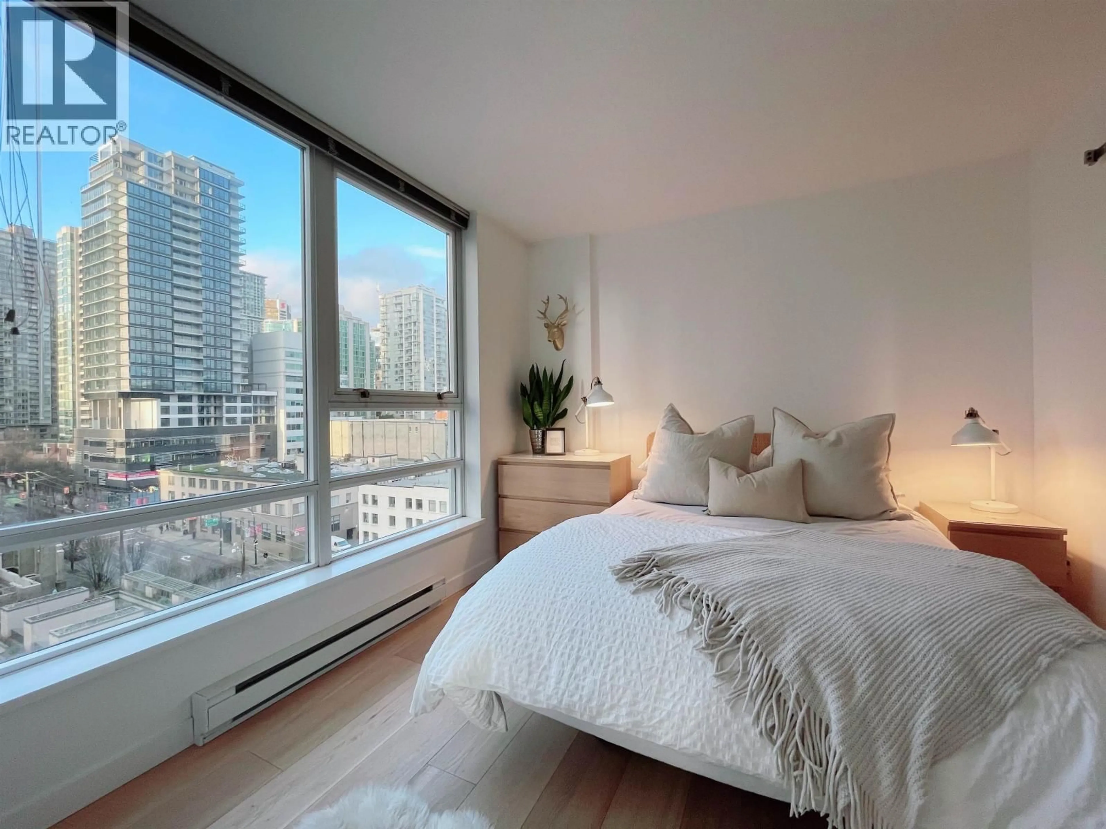 Bedroom with bed, wood/laminate floor for 1110 - 928 BEATTY STREET, Vancouver British Columbia V6Z3G6