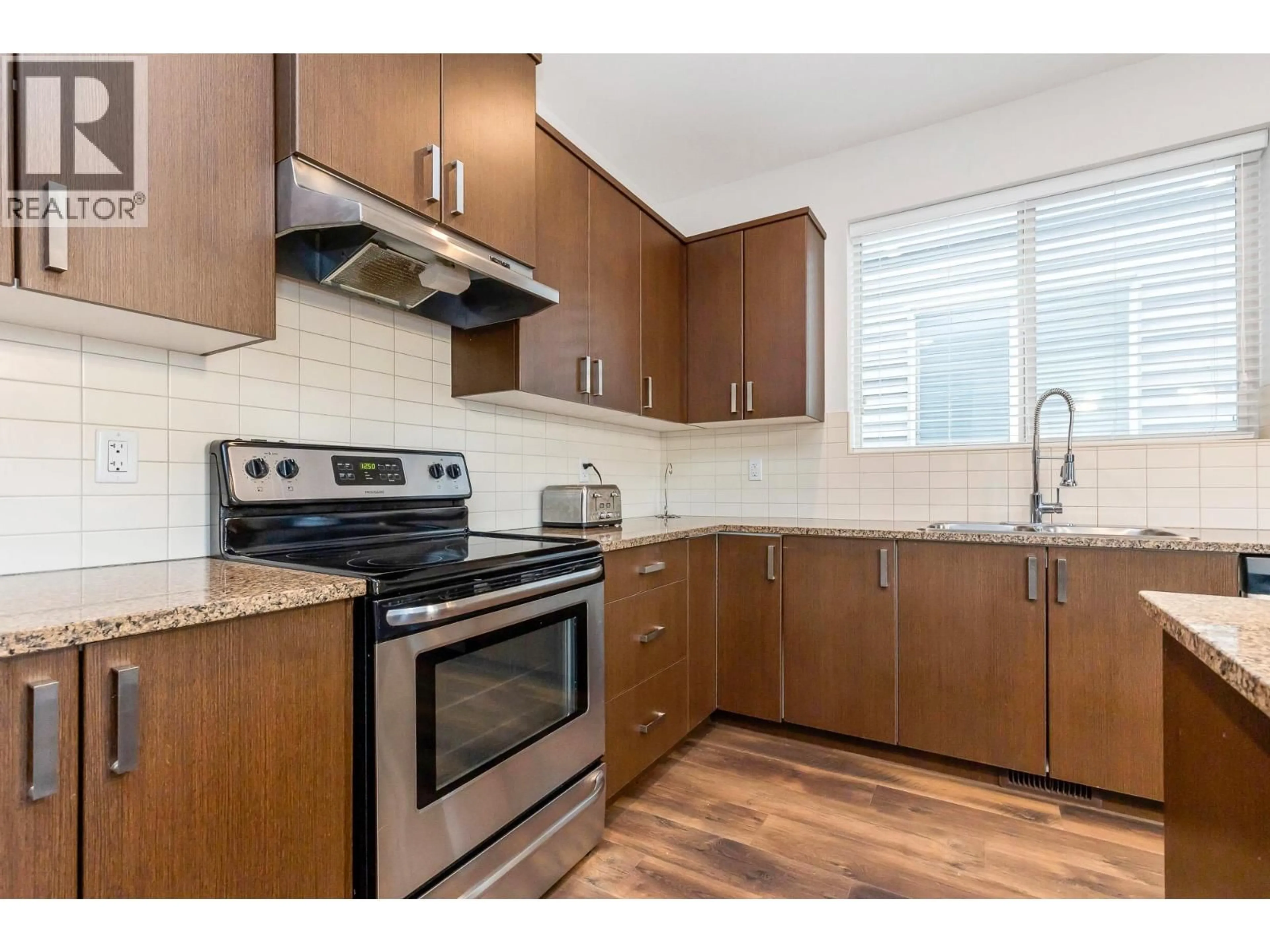 Standard kitchen, wood/laminate floor for 10777 ERSKINE STREET, Maple Ridge British Columbia V2W0E9