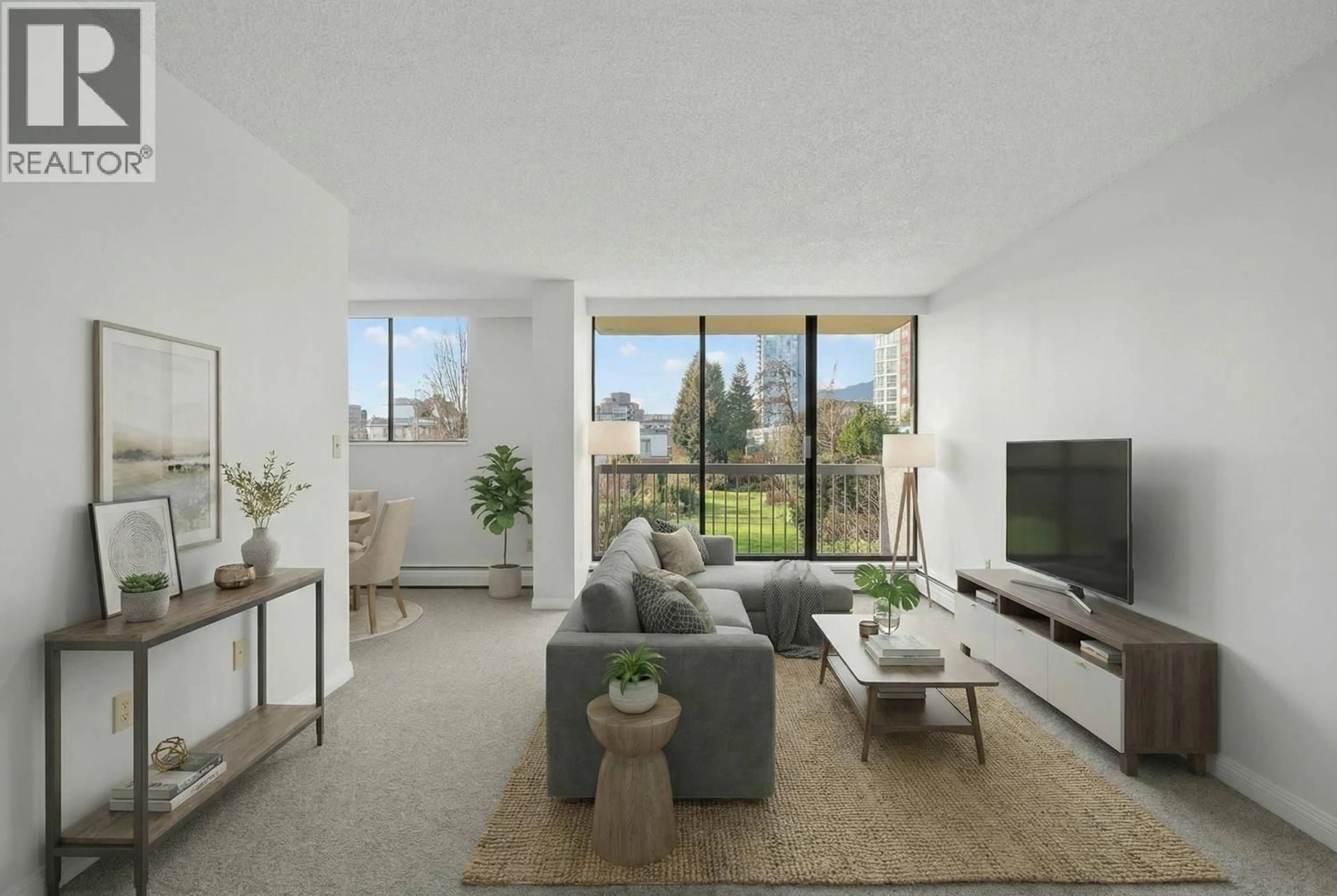 Living room with furniture, unknown for 203 - 145 ST. GEORGES AVENUE, North Vancouver British Columbia V7L3G8