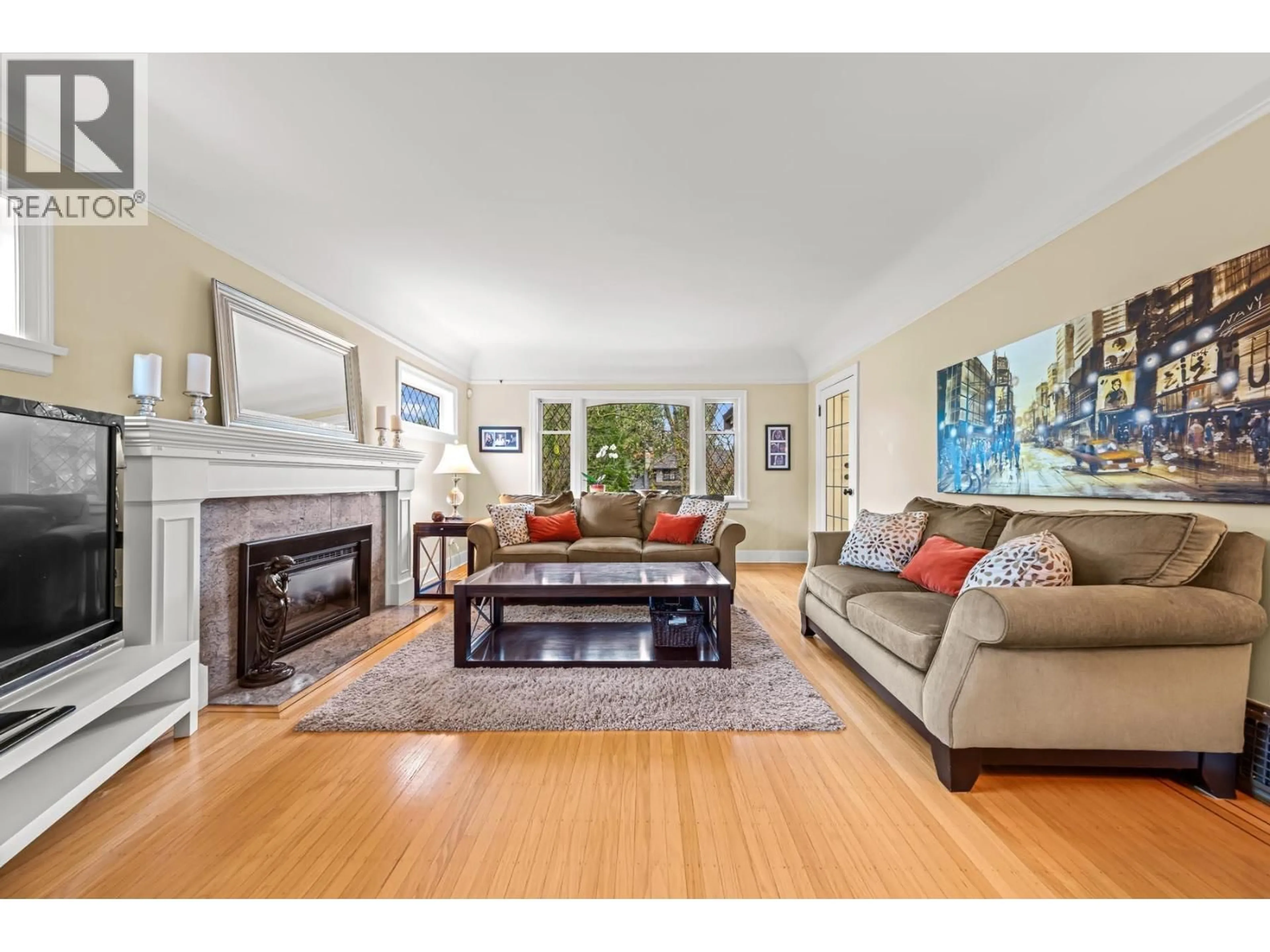 Living room with furniture, wood/laminate floor for 5790 ALMA STREET, Vancouver British Columbia V6N1Y4