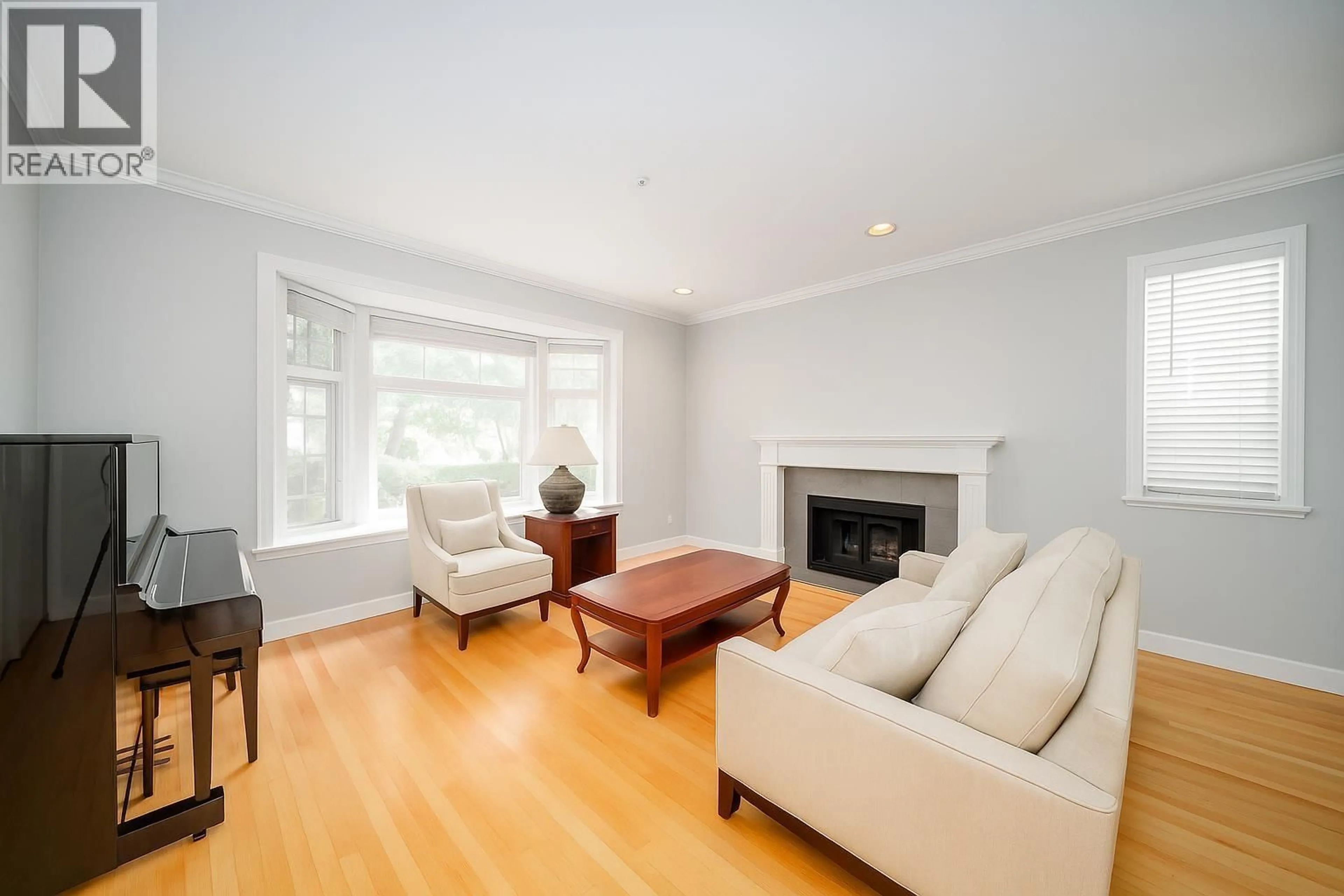 Living room with furniture, wood/laminate floor for 2726 42ND AVENUE, Vancouver British Columbia V6N3G5