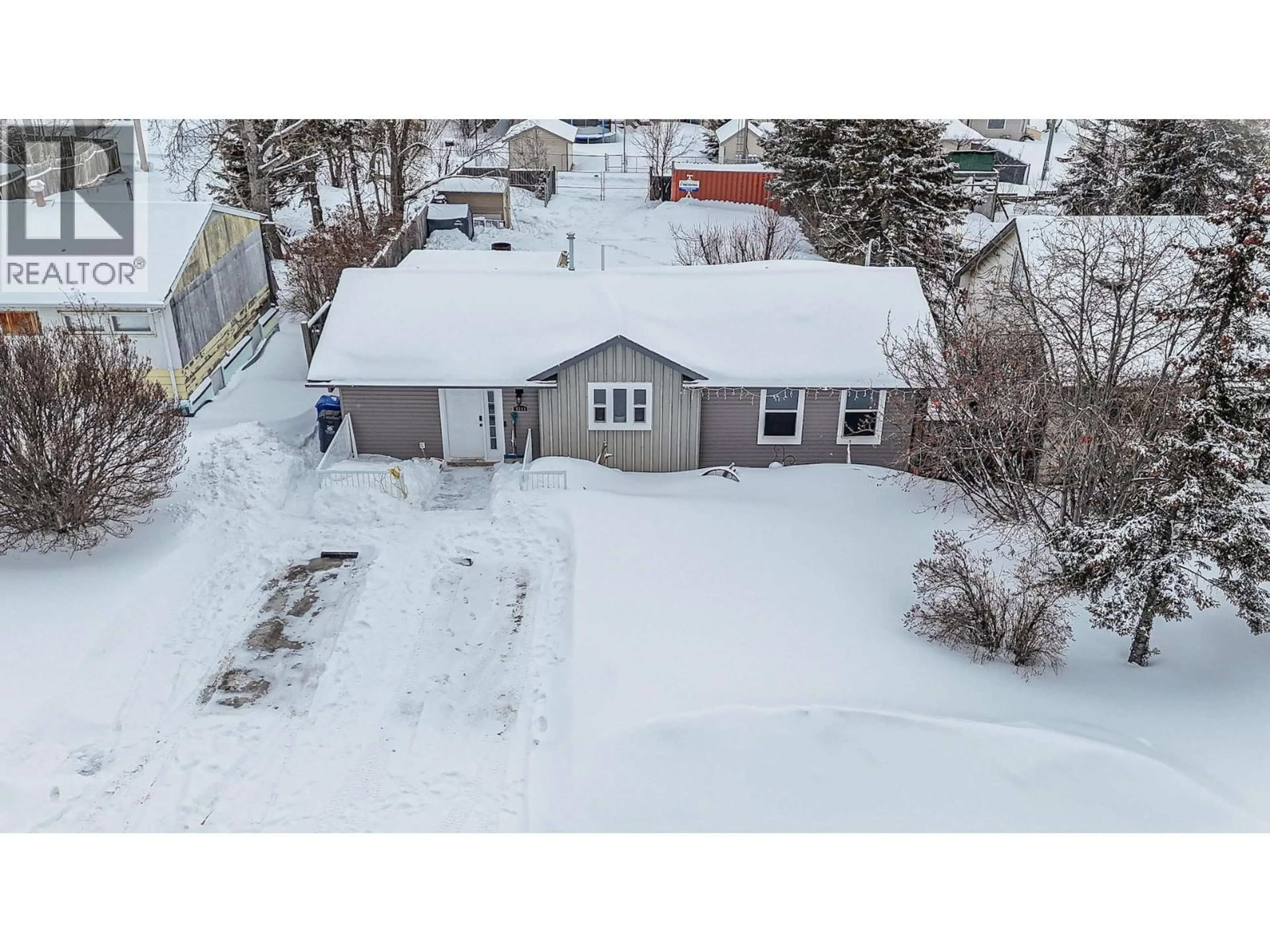 A pic from outside/outdoor area/front of a property/back of a property/a pic from drone, street for 9311 97 AVENUE, Fort St. John British Columbia V1J1M5
