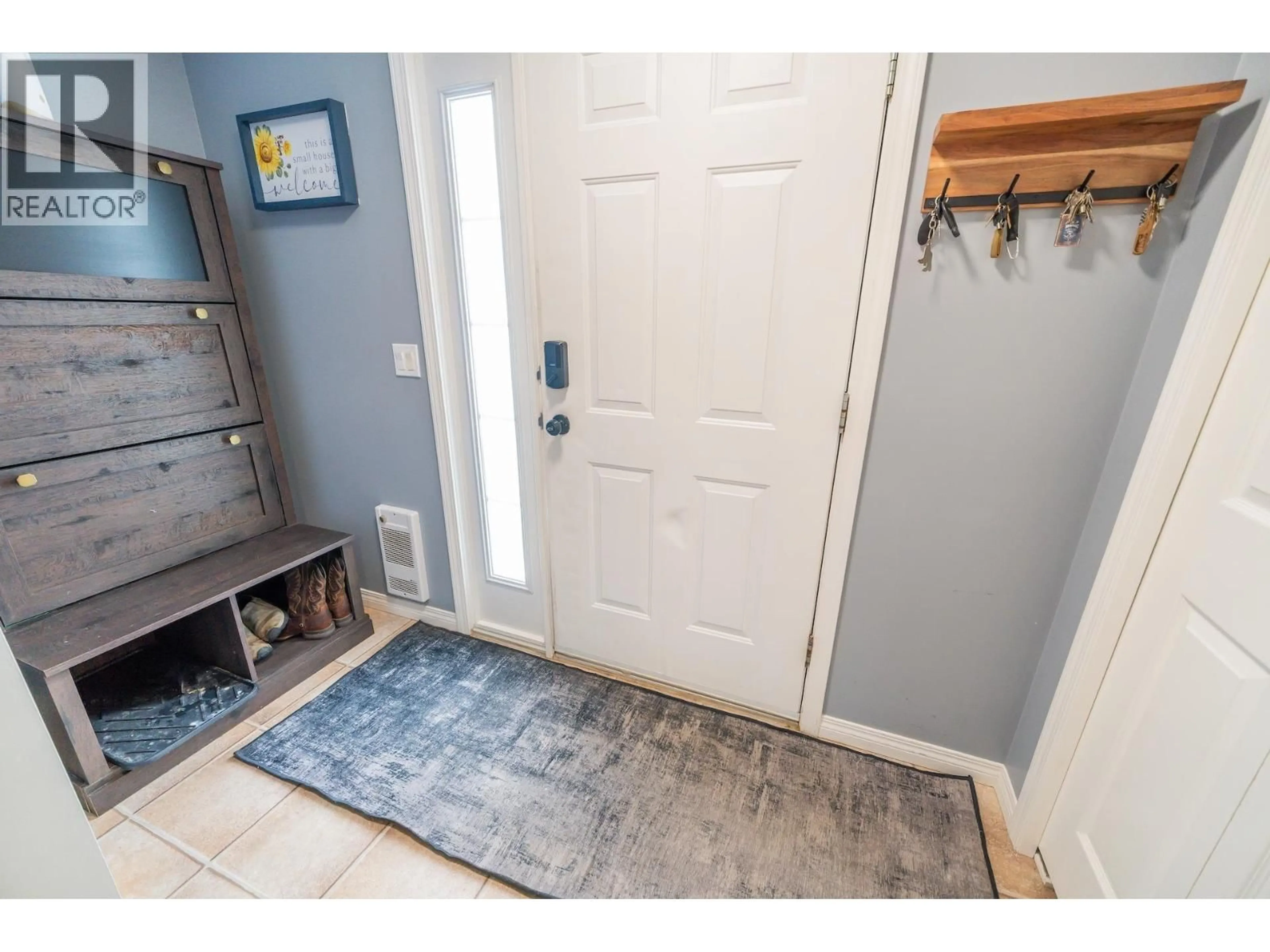 Indoor entryway for 9311 97 AVENUE, Fort St. John British Columbia V1J1M5