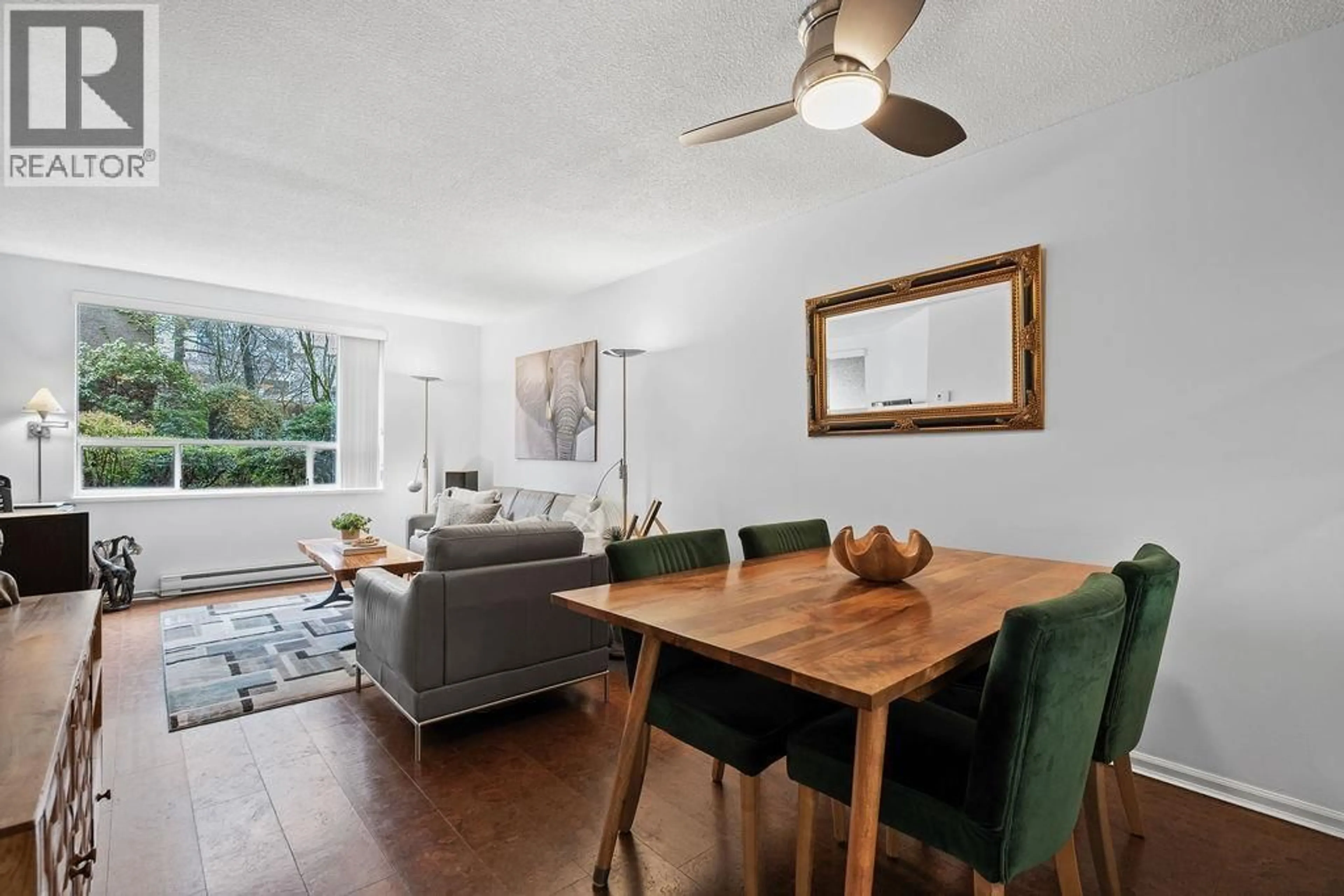 Living room with furniture, wood/laminate floor for 205 - 1050 BROUGHTON STREET, Vancouver British Columbia V6G2A6