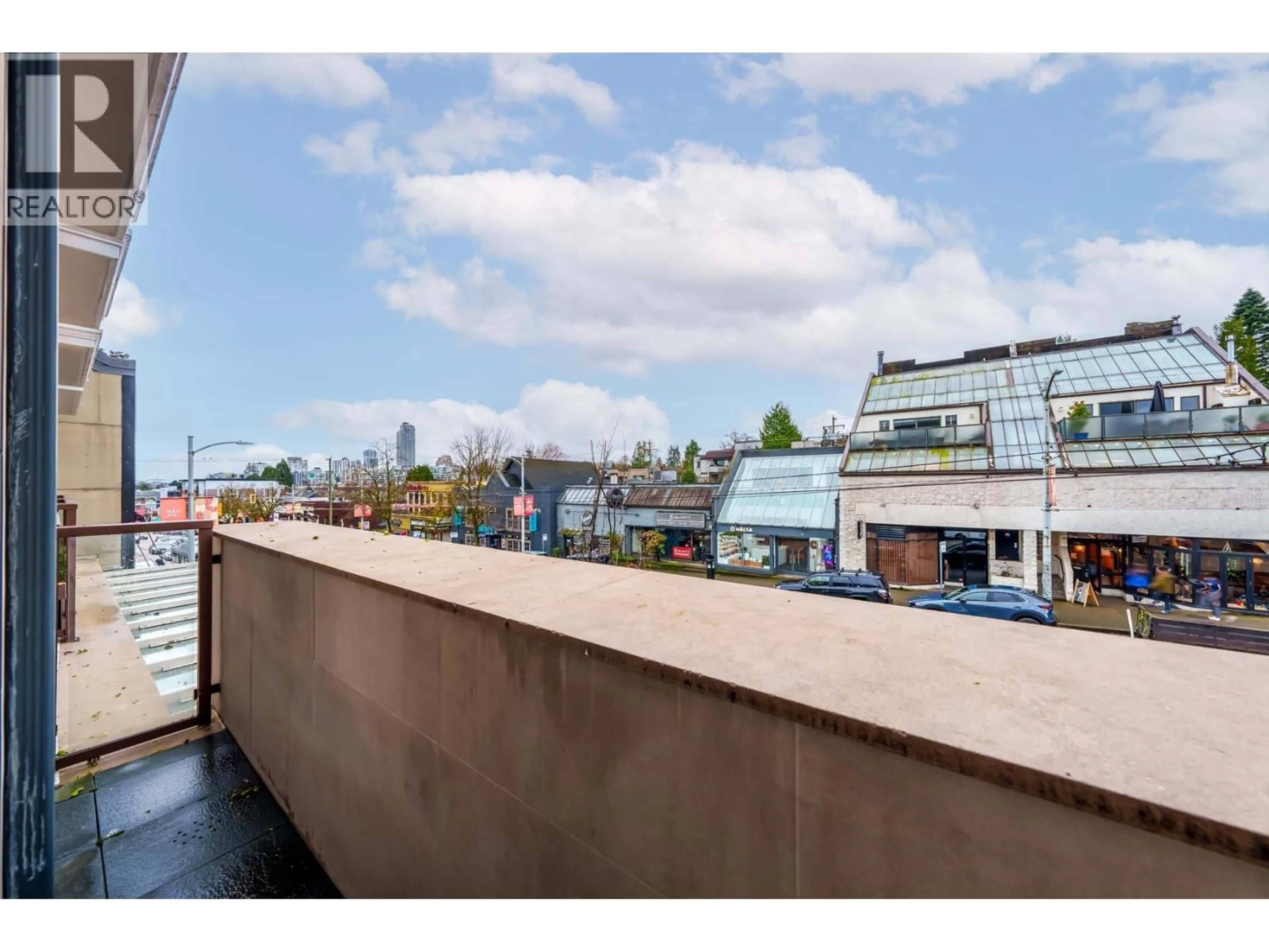 Balcony in the apartment, city buildings view from balcony for 205 - 2035 4TH AVENUE, Vancouver British Columbia V6J1N3