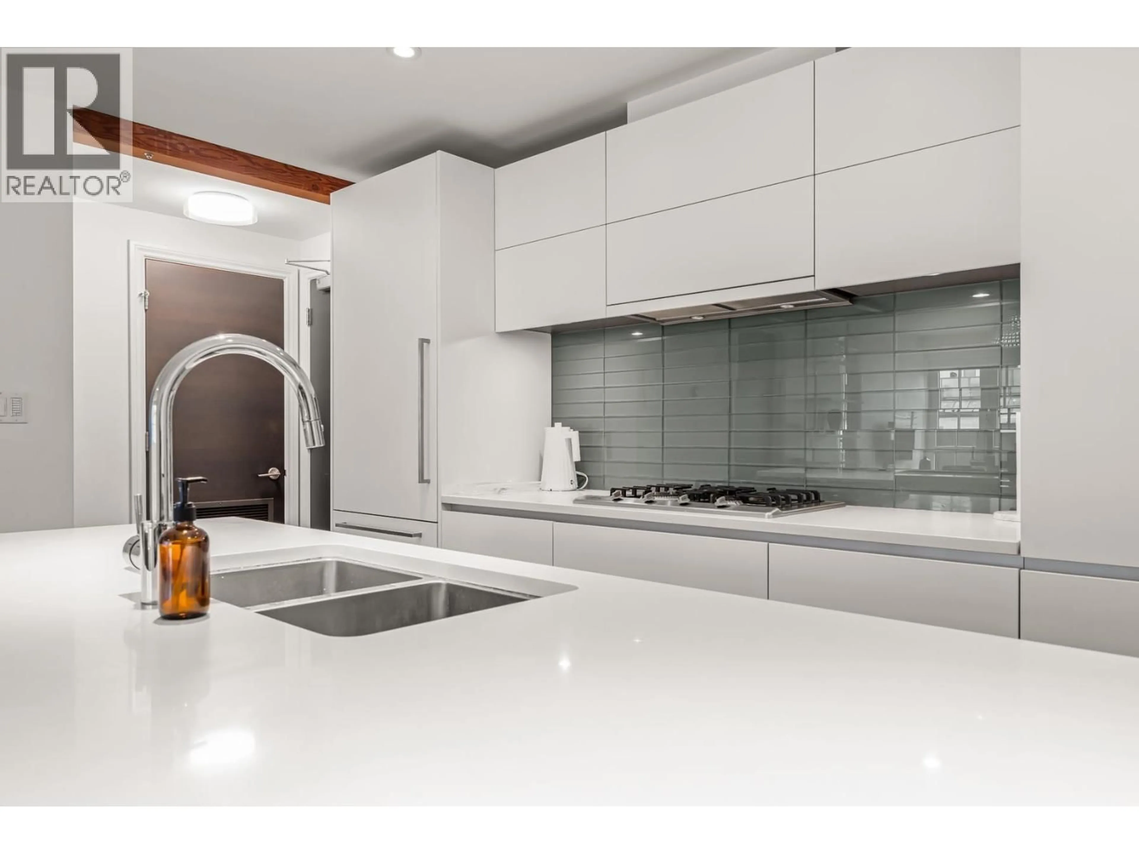 Contemporary kitchen, ceramic/tile floor for 205 - 2035 4TH AVENUE, Vancouver British Columbia V6J1N3