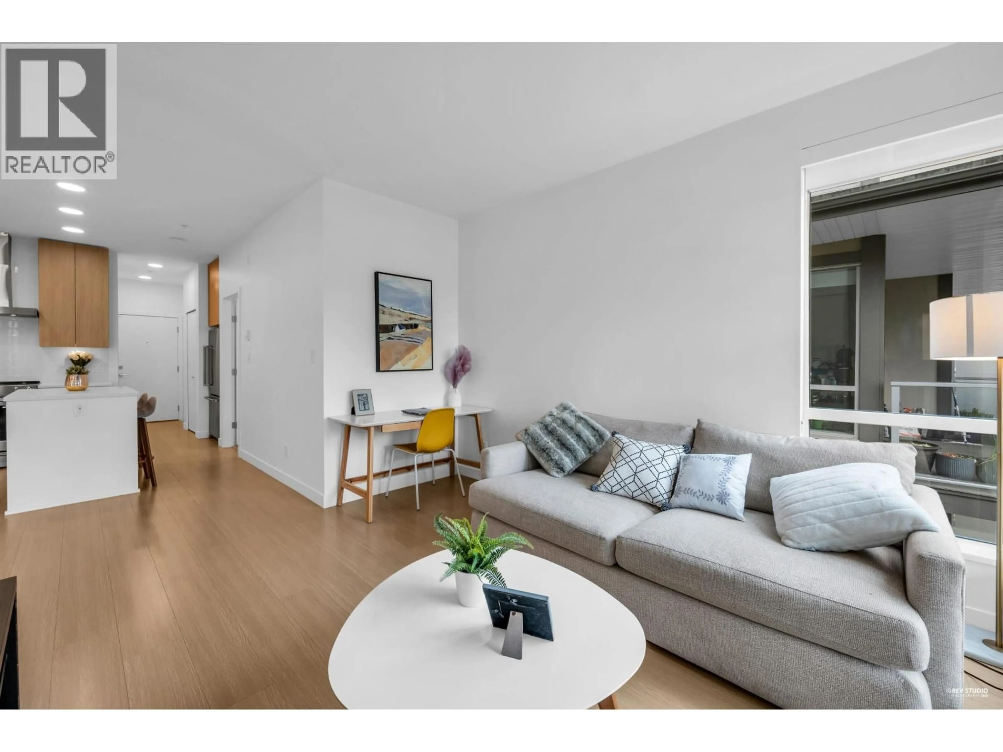 Living room with furniture, wood/laminate floor for 318 - 5460 BROADWAY, Burnaby British Columbia V5B0B4