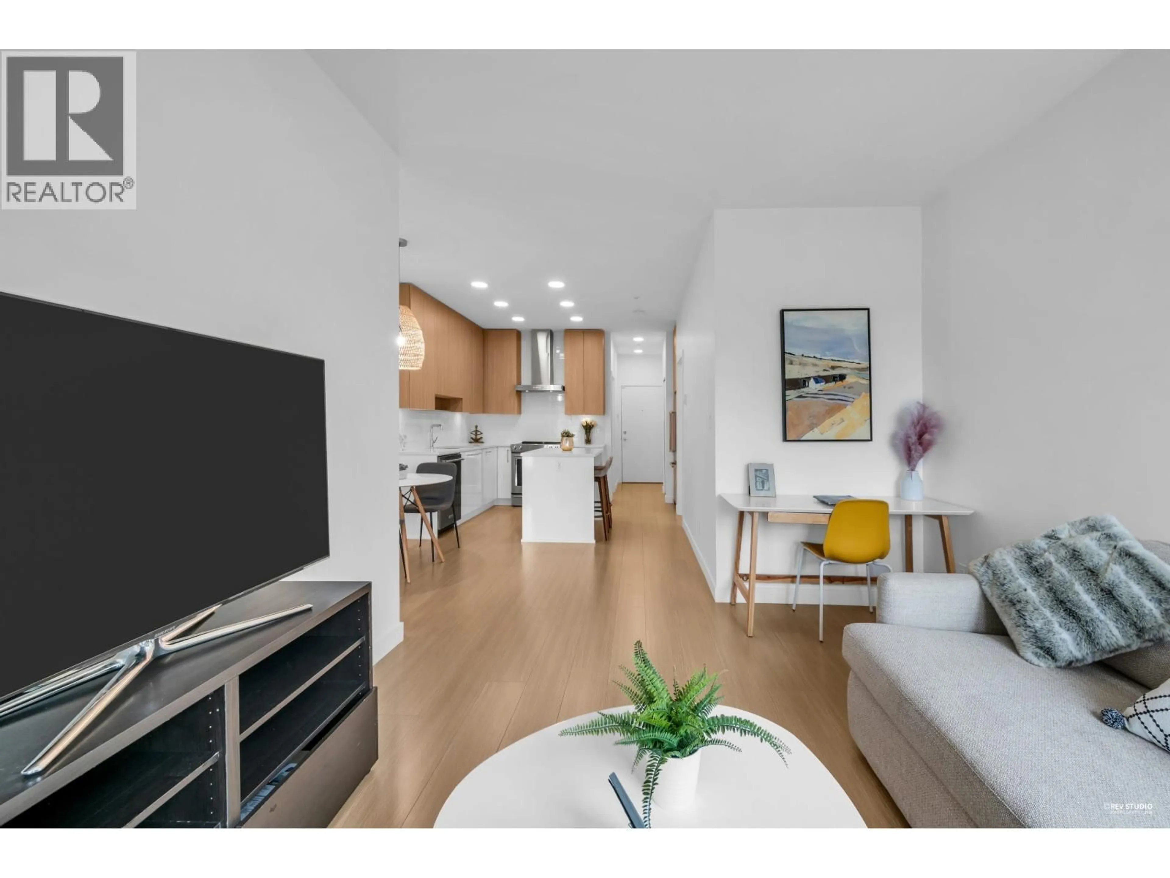 Living room with furniture, wood/laminate floor for 318 - 5460 BROADWAY, Burnaby British Columbia V5B0B4