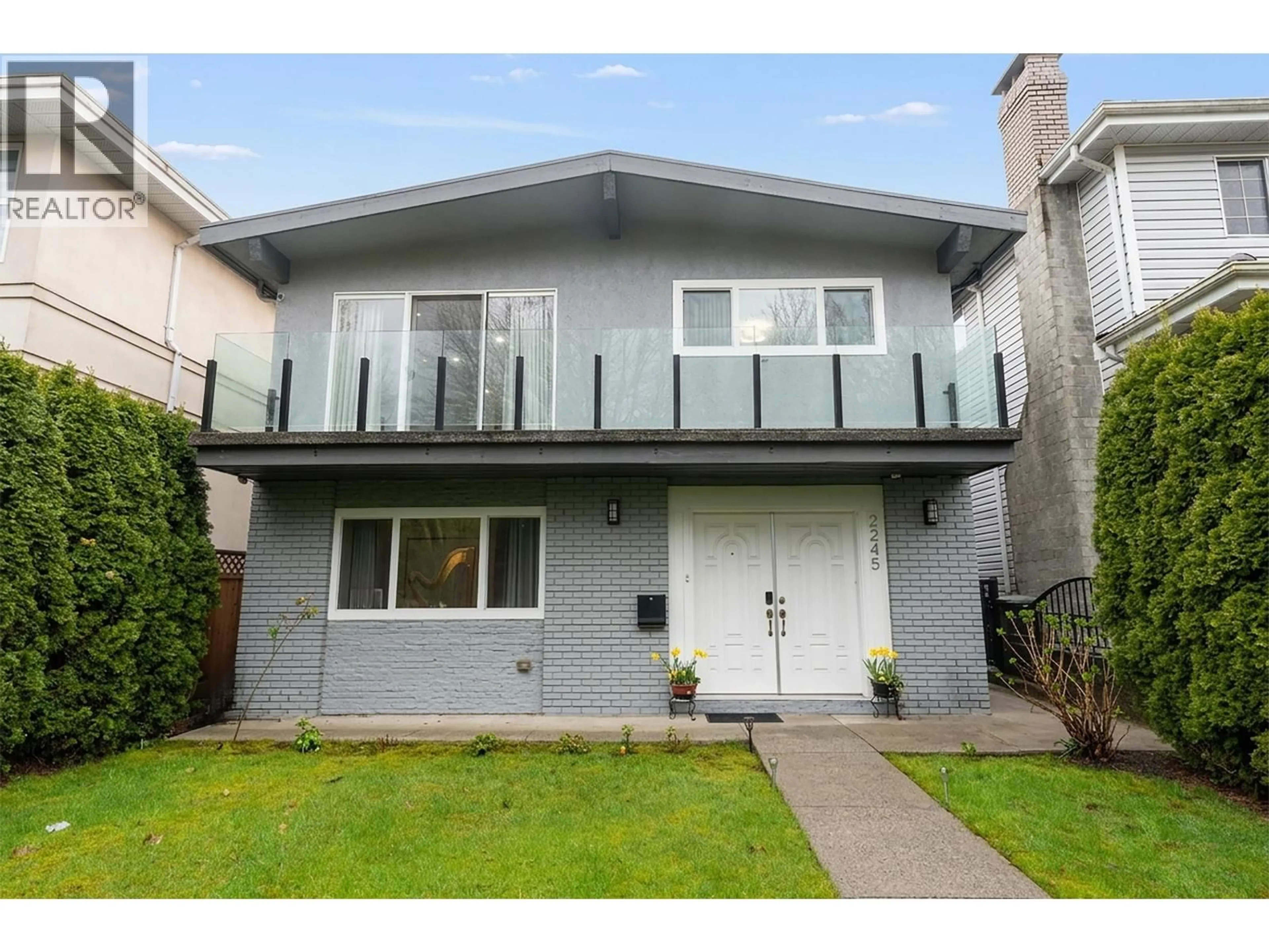 Home with vinyl exterior material, street for 2245 RUPERT STREET, Vancouver British Columbia V5M3S8