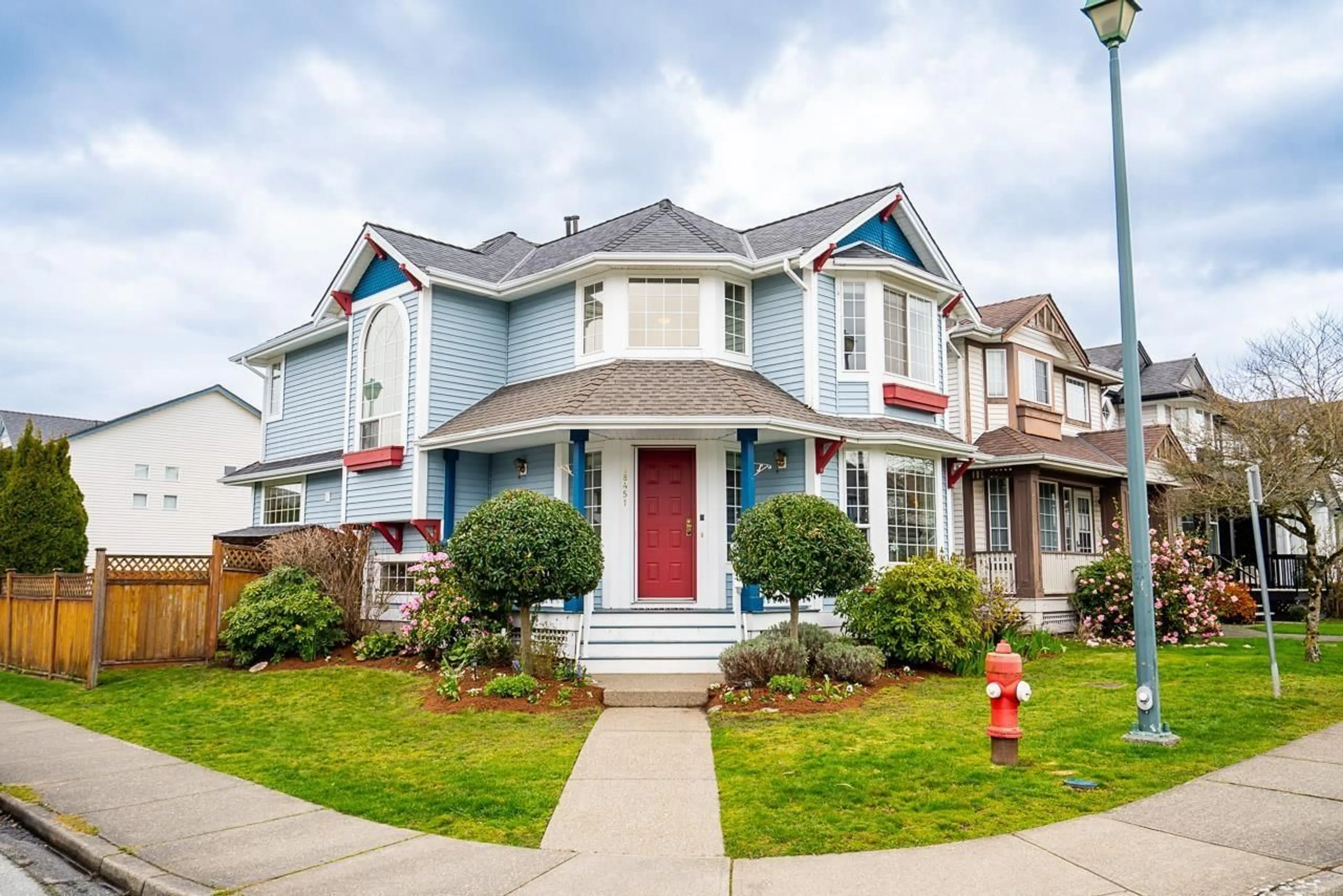 Home with vinyl exterior material, street for 18451 65 AVENUE, Surrey British Columbia V3S8T1