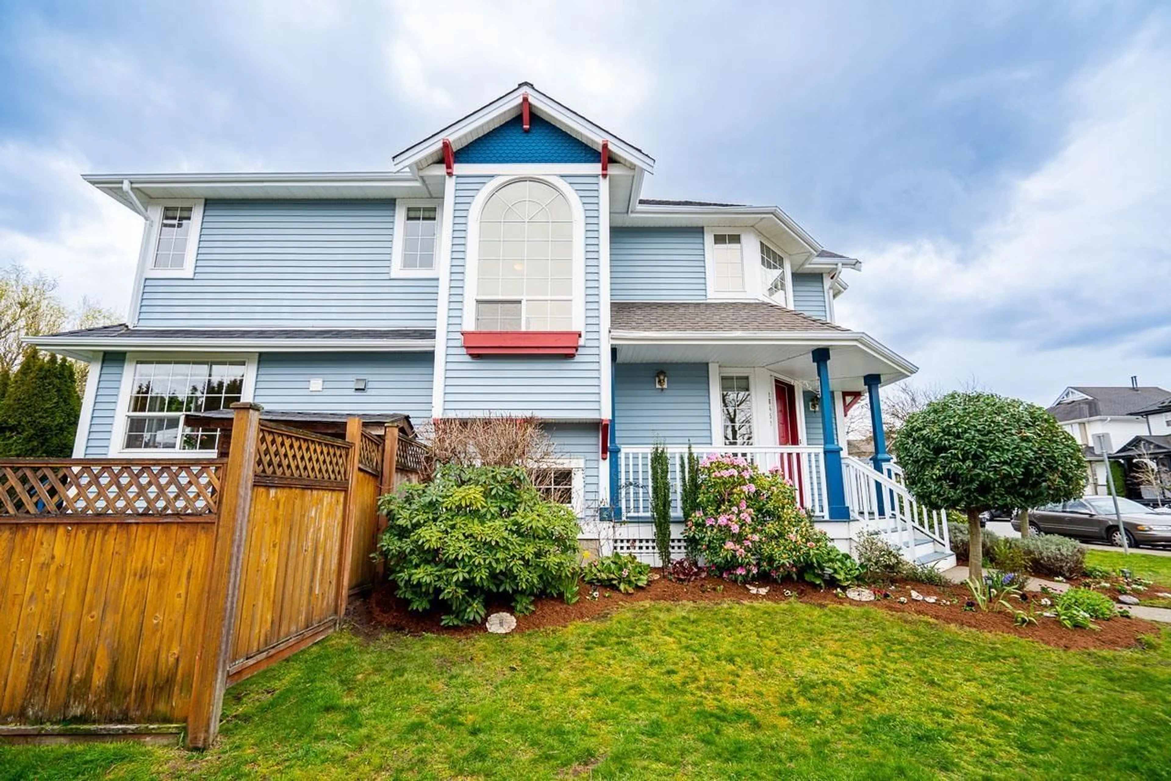 Home with vinyl exterior material, street for 18451 65 AVENUE, Surrey British Columbia V3S8T1