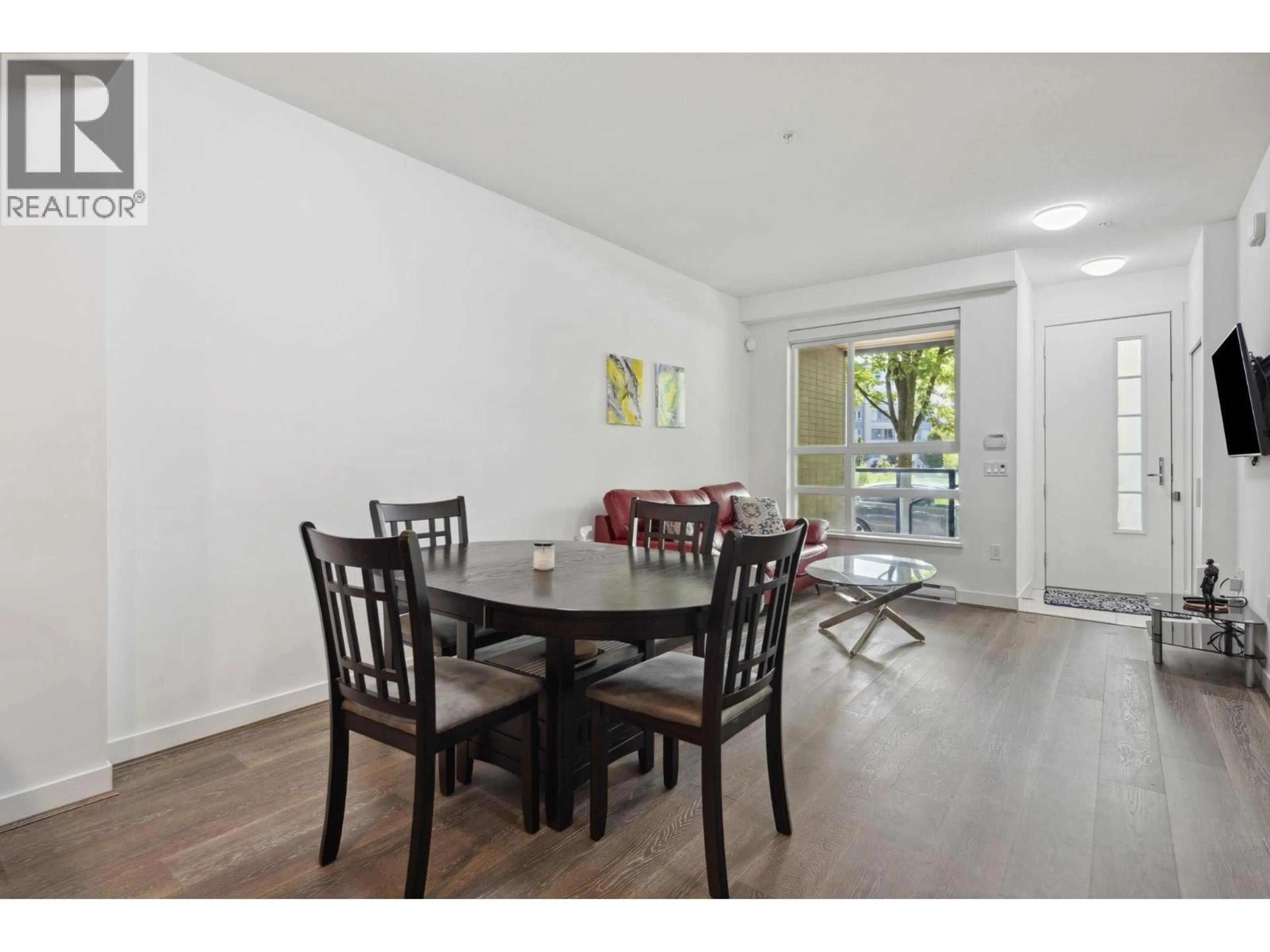 Dining room, wood/laminate floor for 102 - 6033 GRAY AVENUE, Vancouver British Columbia V6S0G3