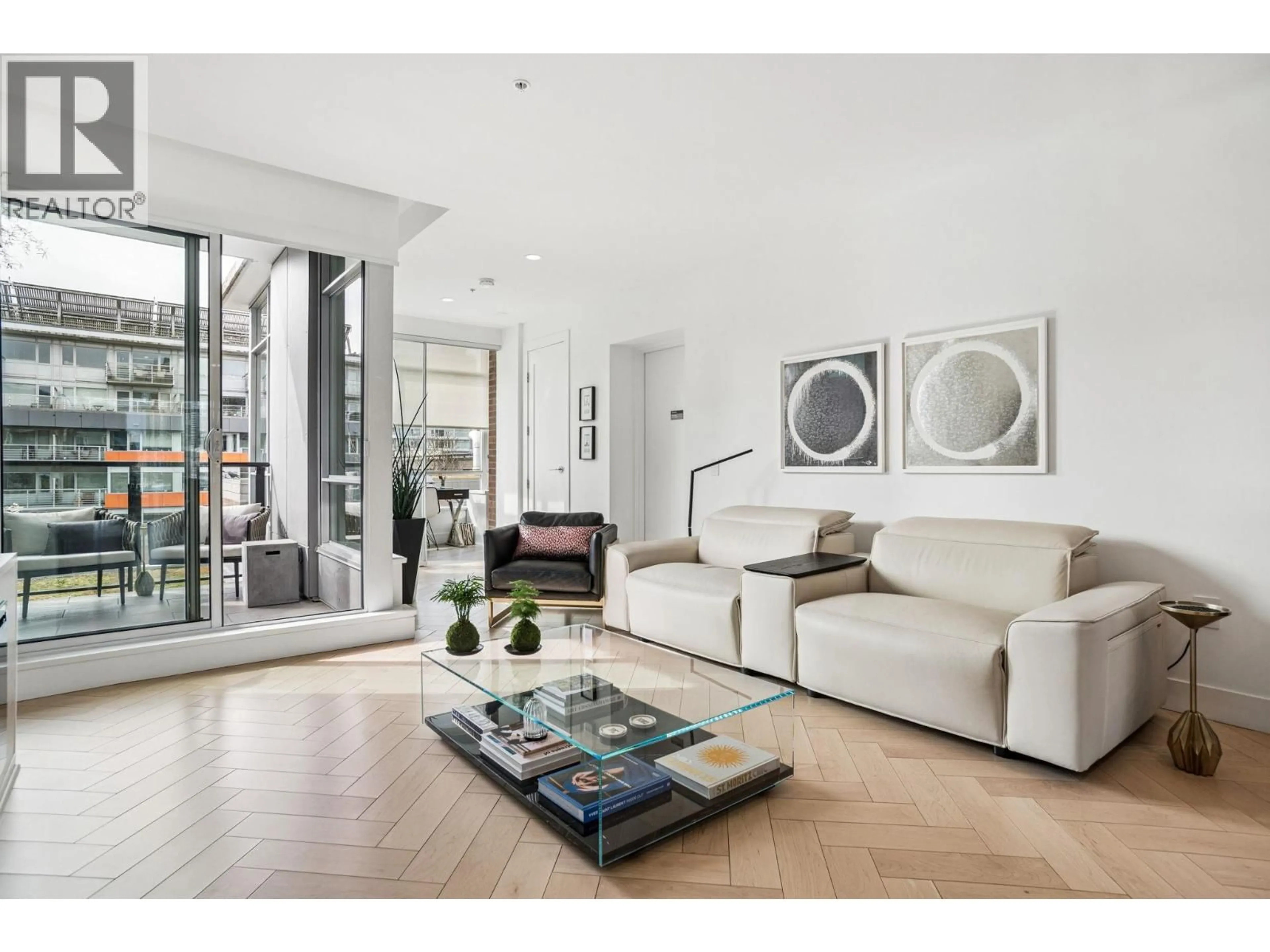 Living room with furniture, unknown for 501 - 138 ATHLETES WAY, Vancouver British Columbia V5Y0B5