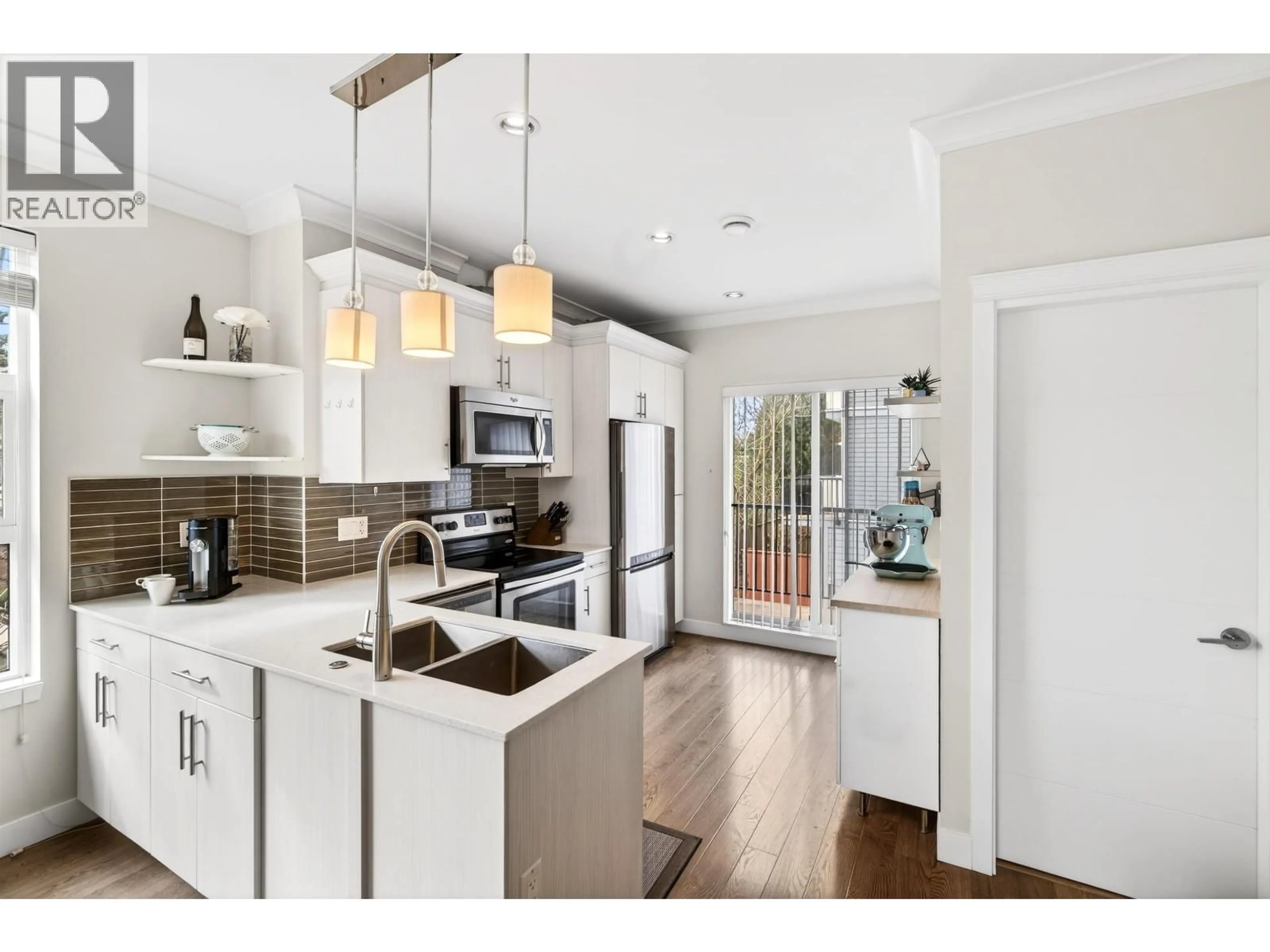 Open concept kitchen, unknown for 14 - 4191 NO. 4 ROAD, Richmond British Columbia V6X2M2