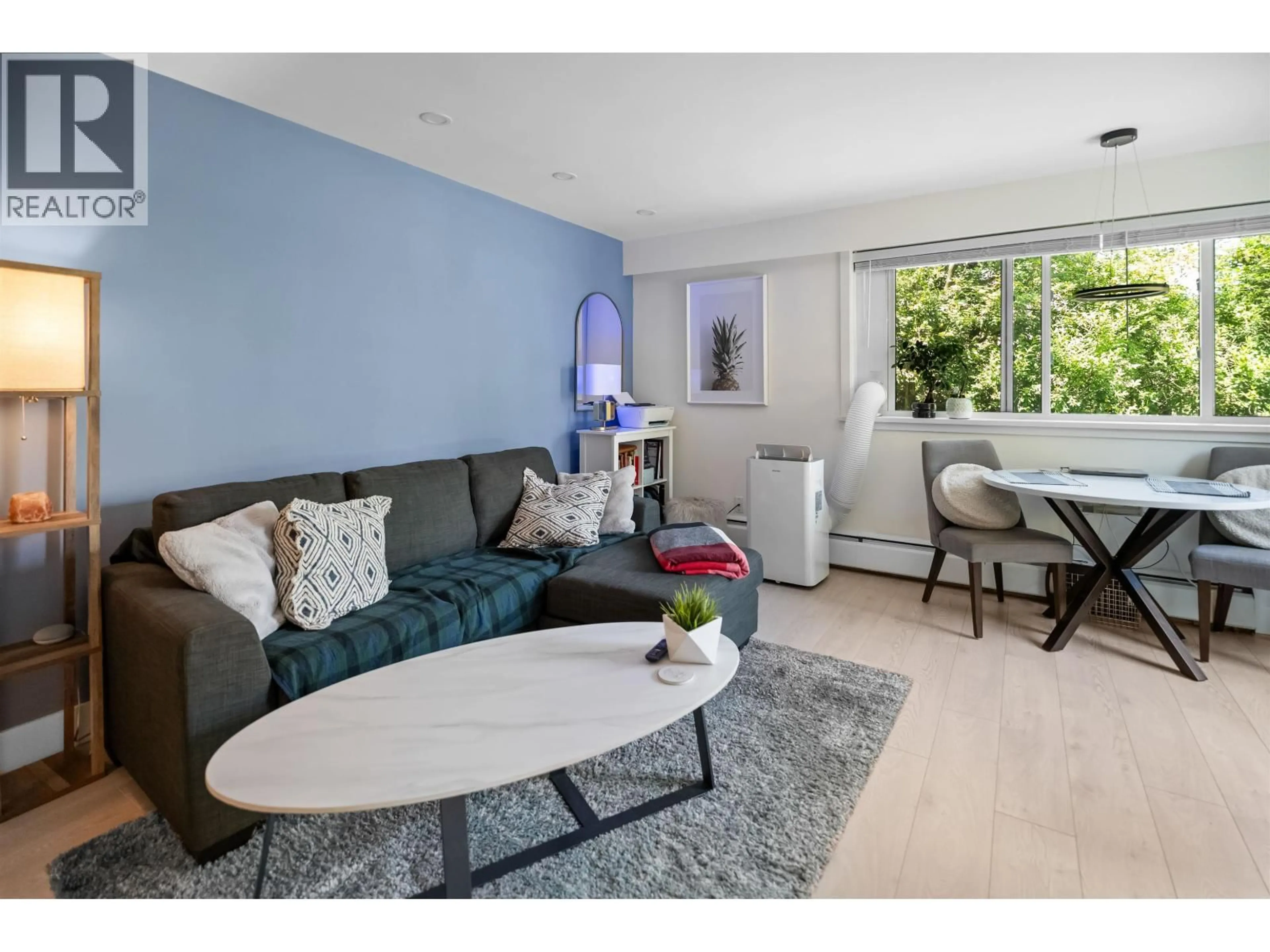 Living room with furniture, wood/laminate floor for 101 - 2121 6TH AVENUE, Vancouver British Columbia V6K1V5