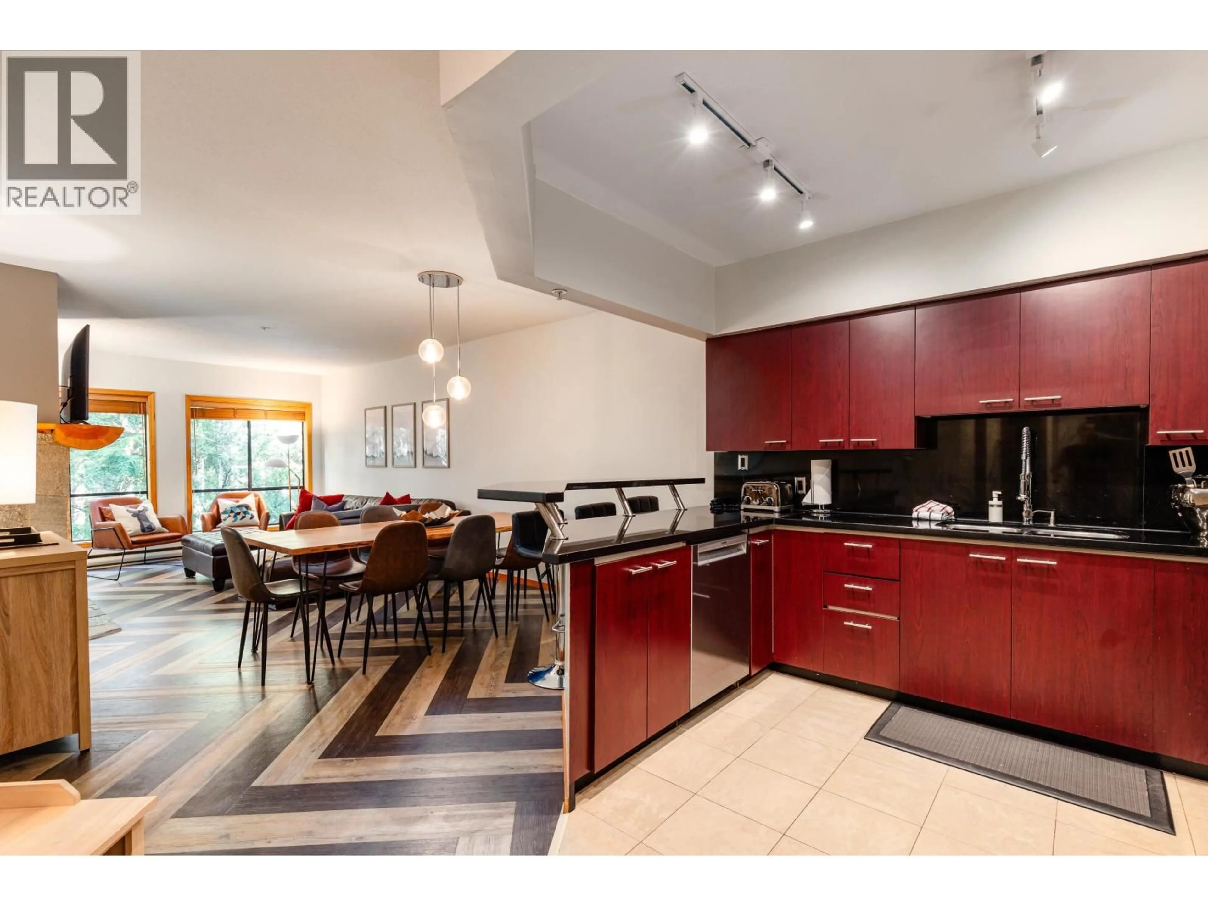 Open concept kitchen, ceramic/tile floor for 102 - 4821 SPEARHEAD DRIVE, Whistler British Columbia V8E1E8