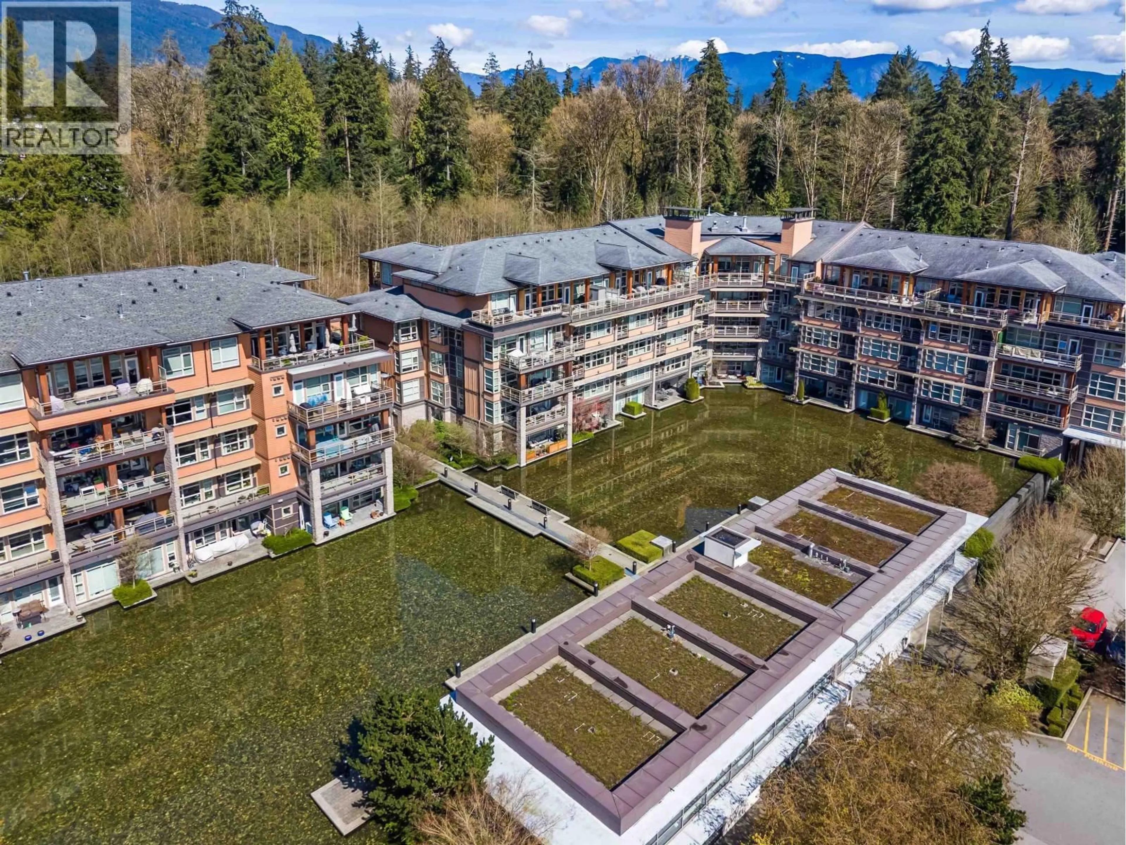 A pic from outside/outdoor area/front of a property/back of a property/a pic from drone, mountain view for 418 - 3606 ALDERCREST DRIVE, North Vancouver British Columbia V7G0A3