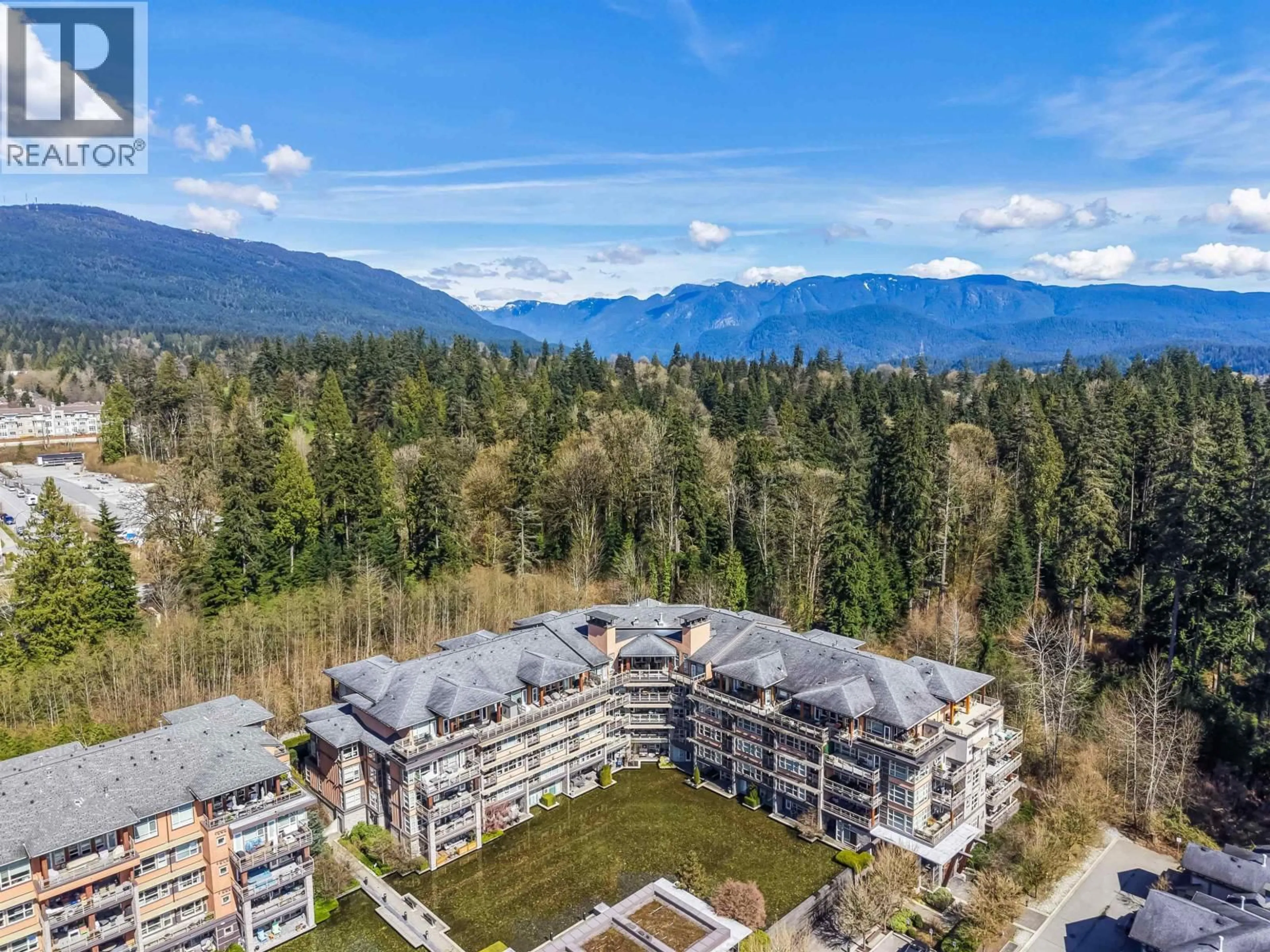 A pic from outside/outdoor area/front of a property/back of a property/a pic from drone, mountain view for 418 - 3606 ALDERCREST DRIVE, North Vancouver British Columbia V7G0A3