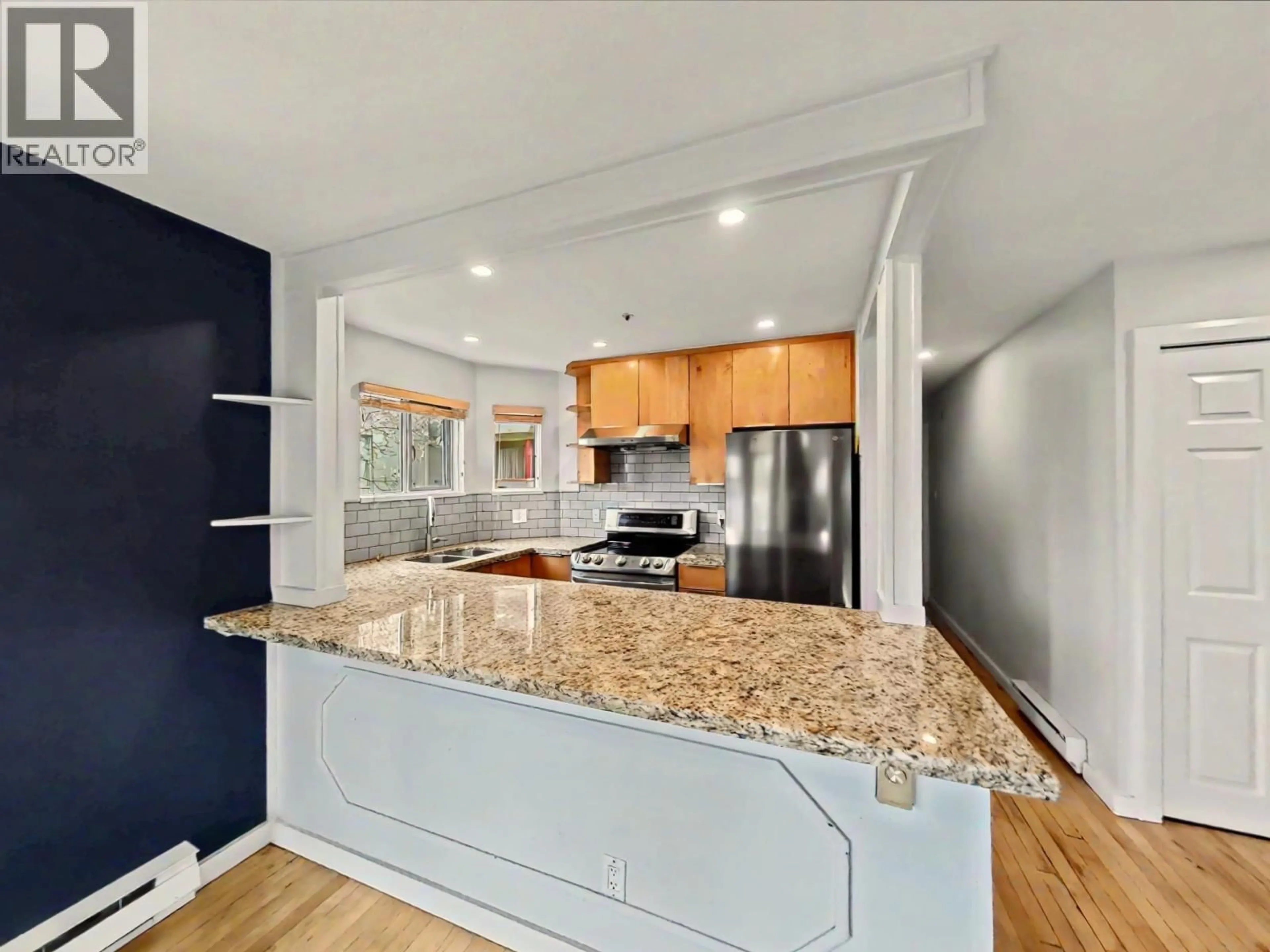 Open concept kitchen, unknown for 201 - 1868 8TH AVENUE, Vancouver British Columbia V6J5G3