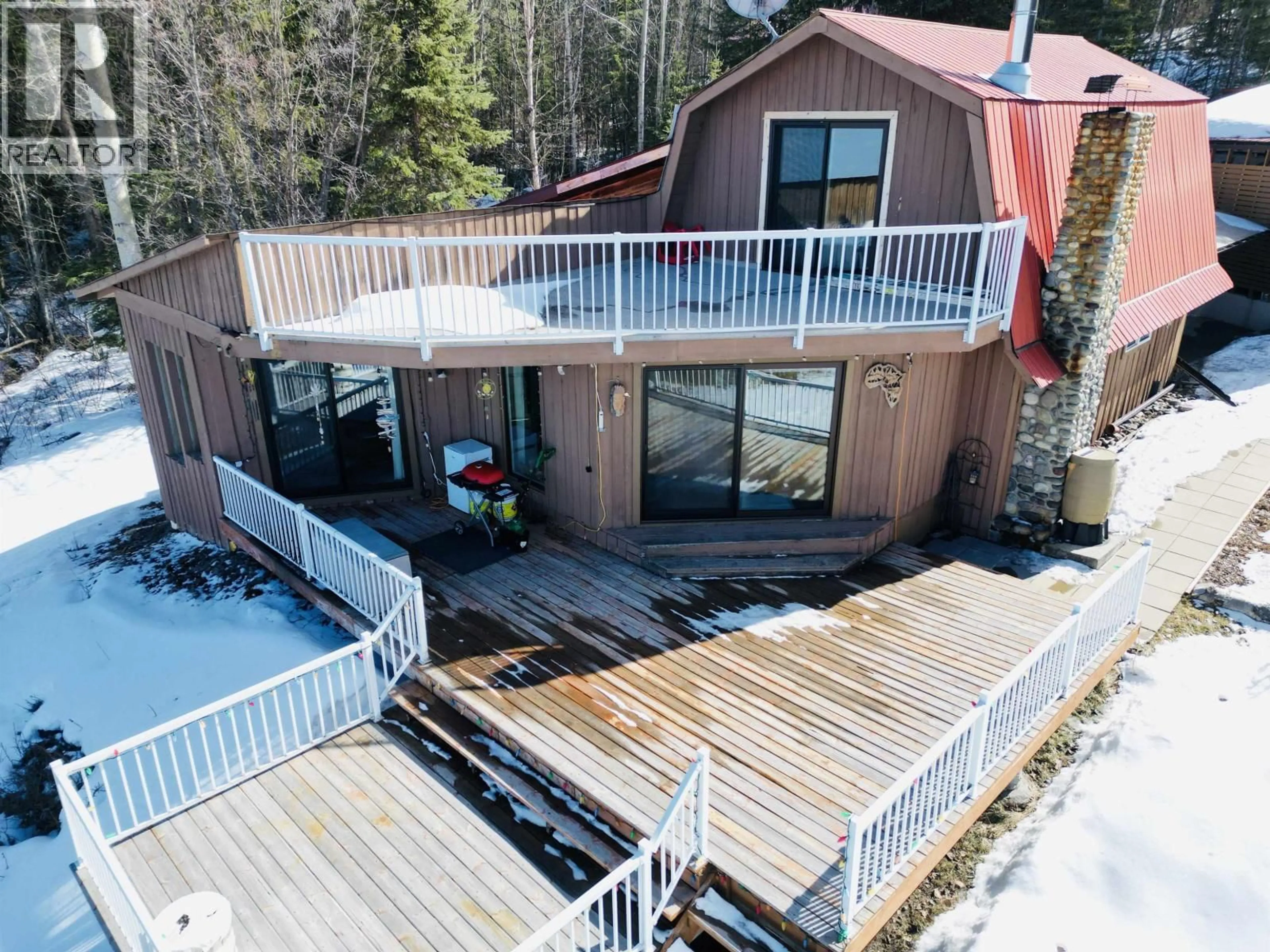 A pic from outside/outdoor area/front of a property/back of a property/a pic from drone, water/lake/river/ocean view for 1725 INDIAN BAY ROAD, Burns Lake British Columbia V0J2P0