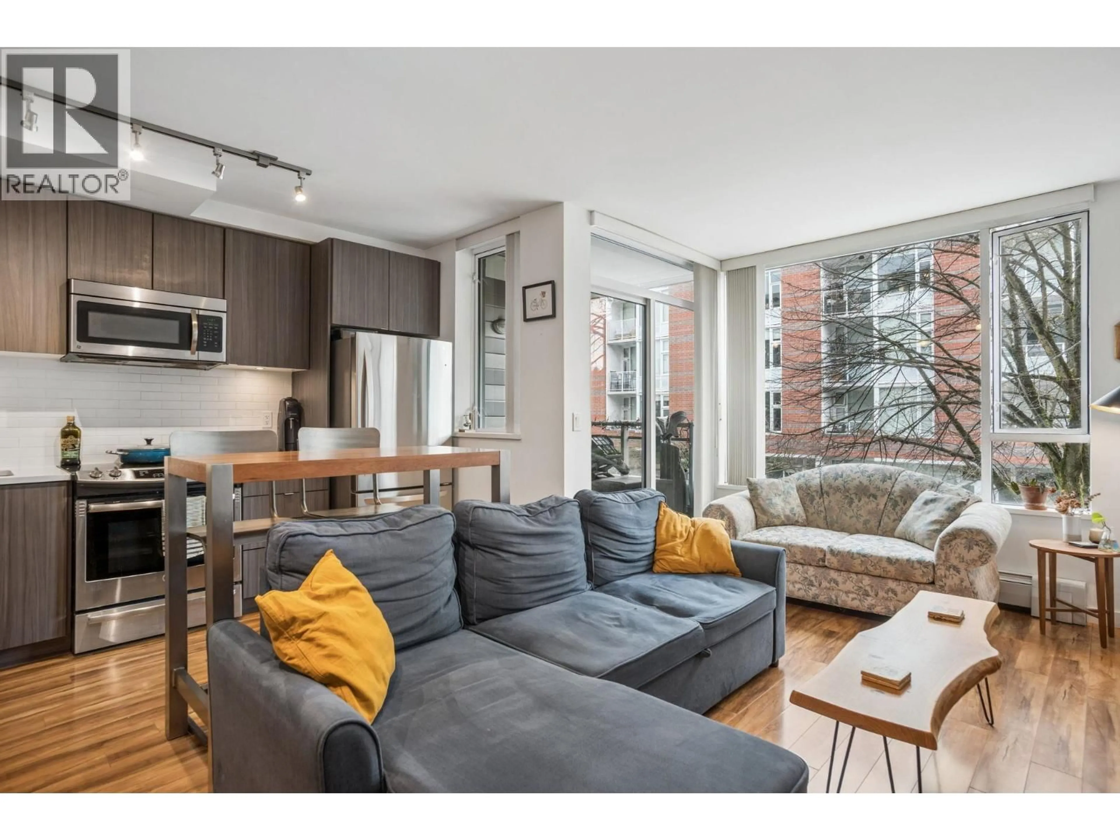 Living room with furniture, unknown for 206 - 289 6TH AVENUE, Vancouver British Columbia V5T0E9