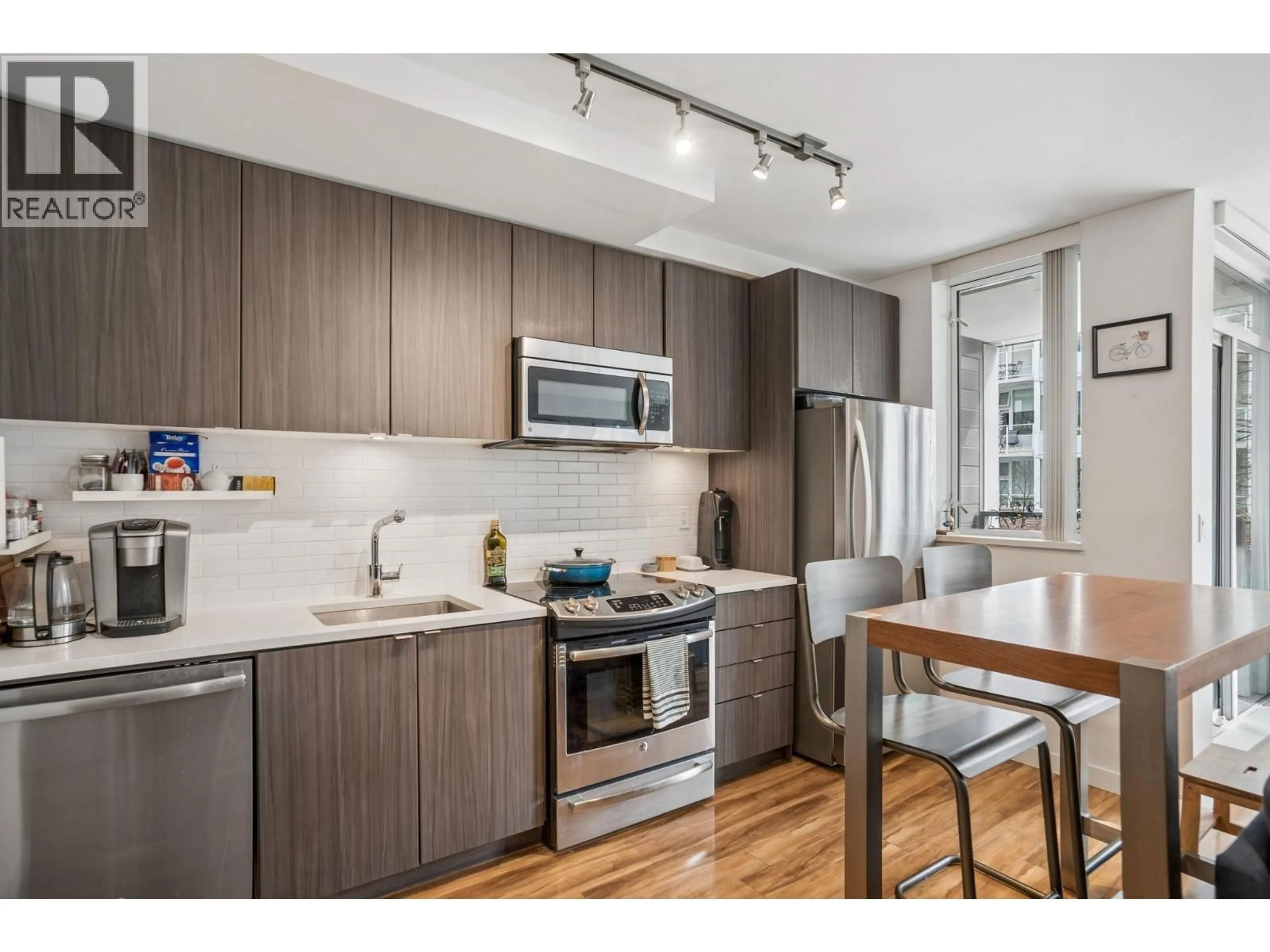 Standard kitchen, wood/laminate floor for 206 - 289 6TH AVENUE, Vancouver British Columbia V5T0E9