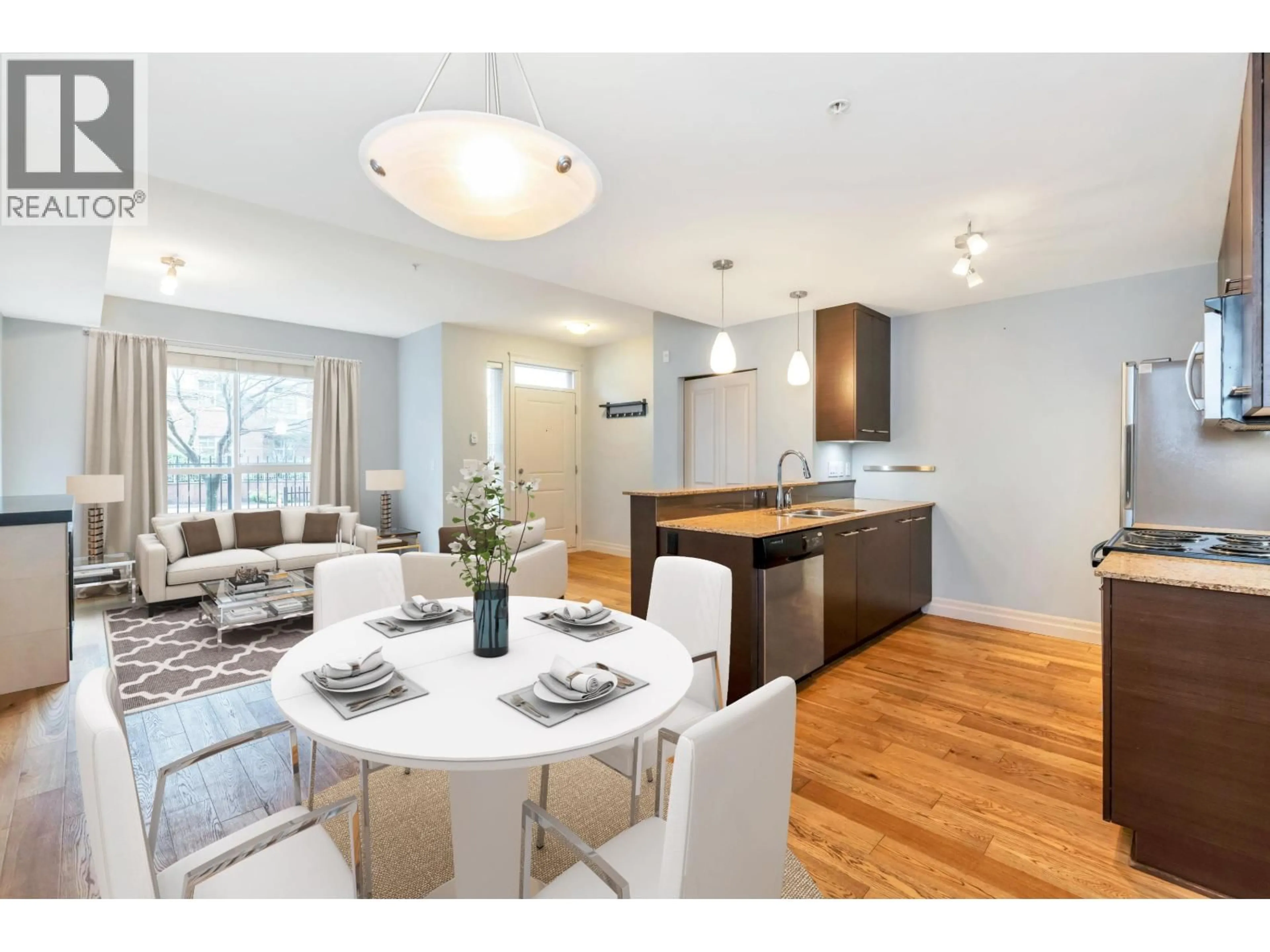 Open concept kitchen, wood/laminate floor for 103 - 2343 ATKINS AVENUE, Port Coquitlam British Columbia V3C1Y7