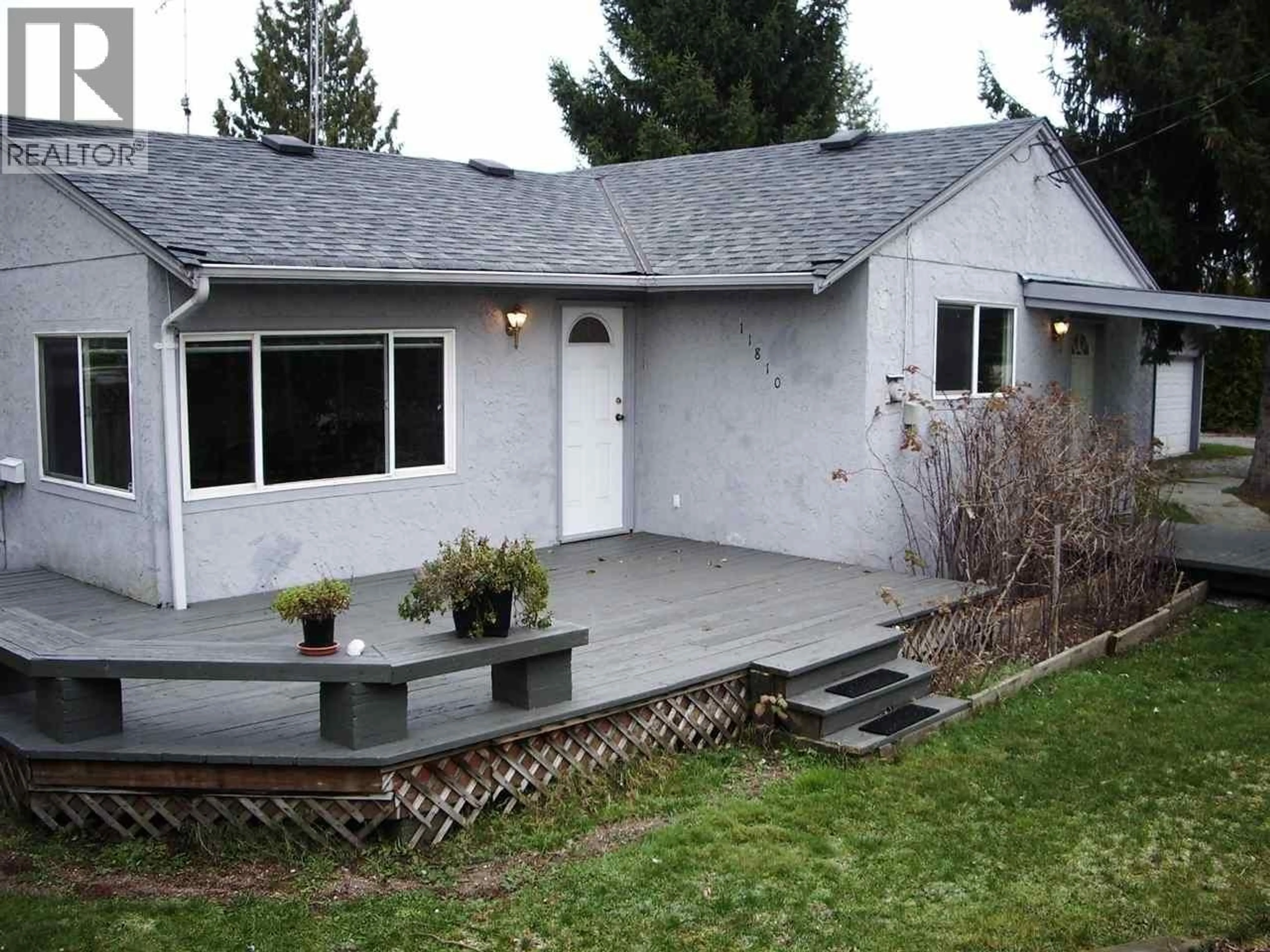 Home with vinyl exterior material, street for 11810 207 STREET, Maple Ridge British Columbia V2X1X5