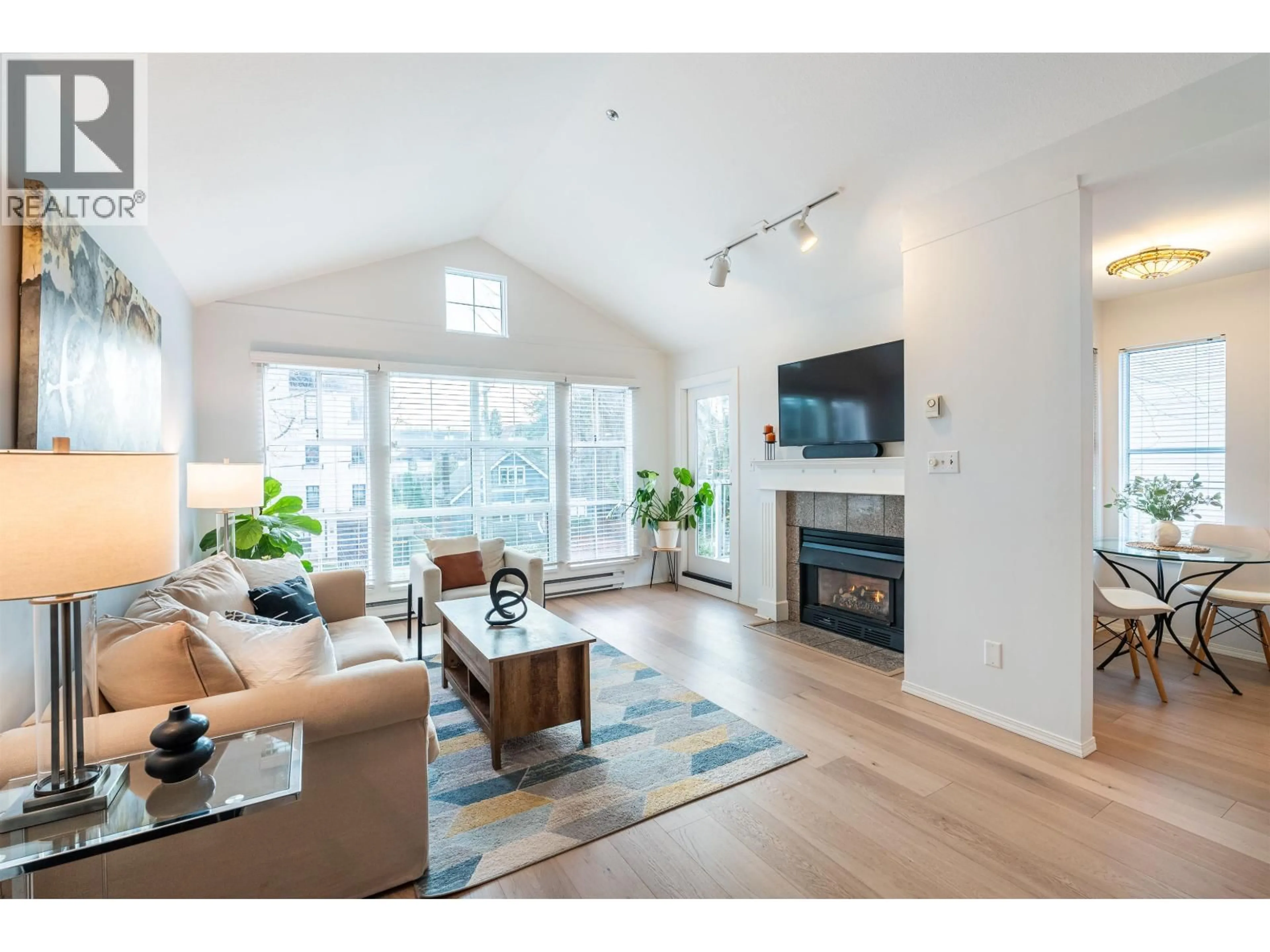 Living room with furniture, wood/laminate floor for 302 - 655 13TH AVENUE, Vancouver British Columbia V5Z1N8