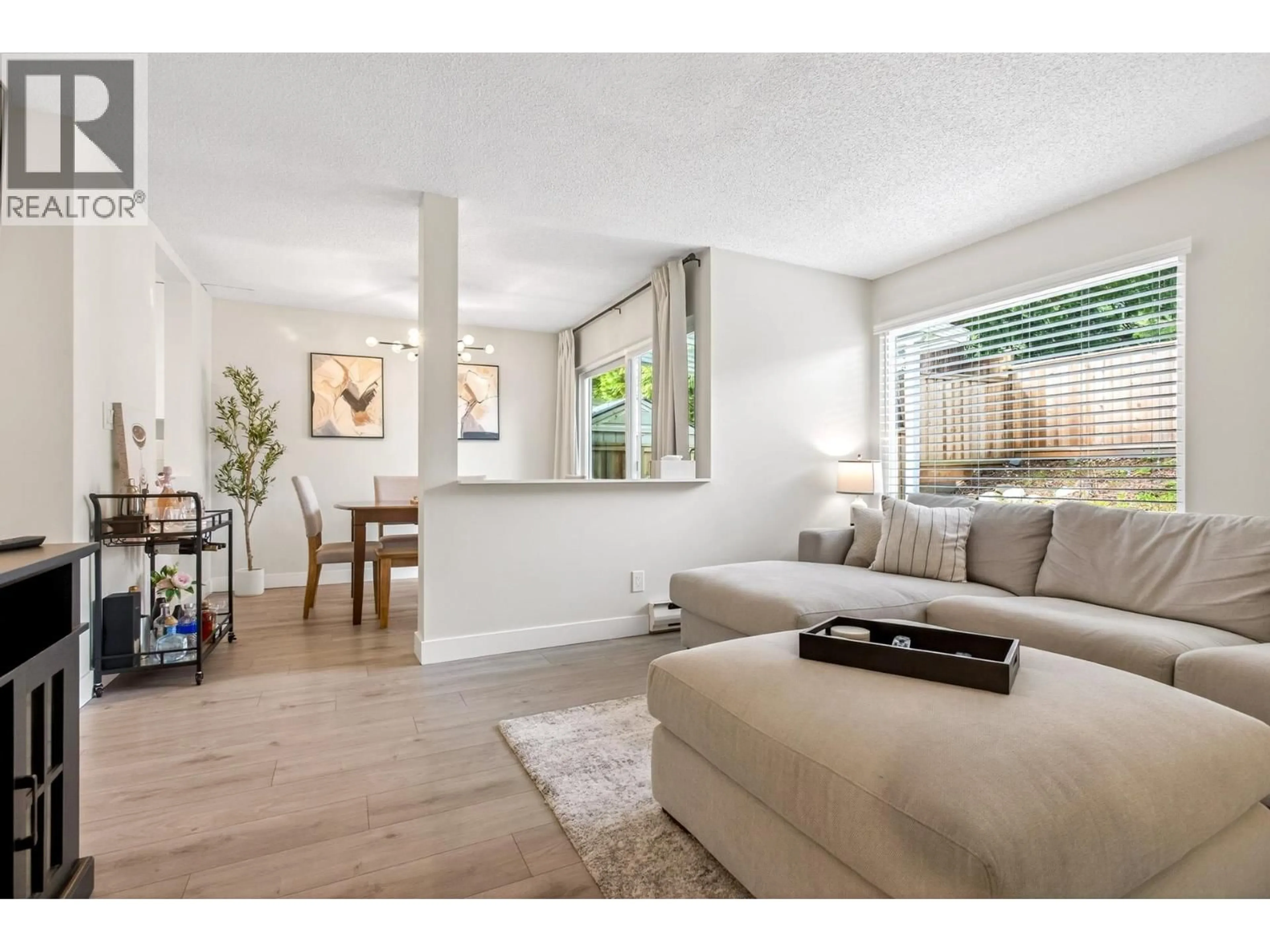 Living room with furniture, wood/laminate floor for 17 - 2590 AUSTIN AVENUE, Coquitlam British Columbia V3K5X4