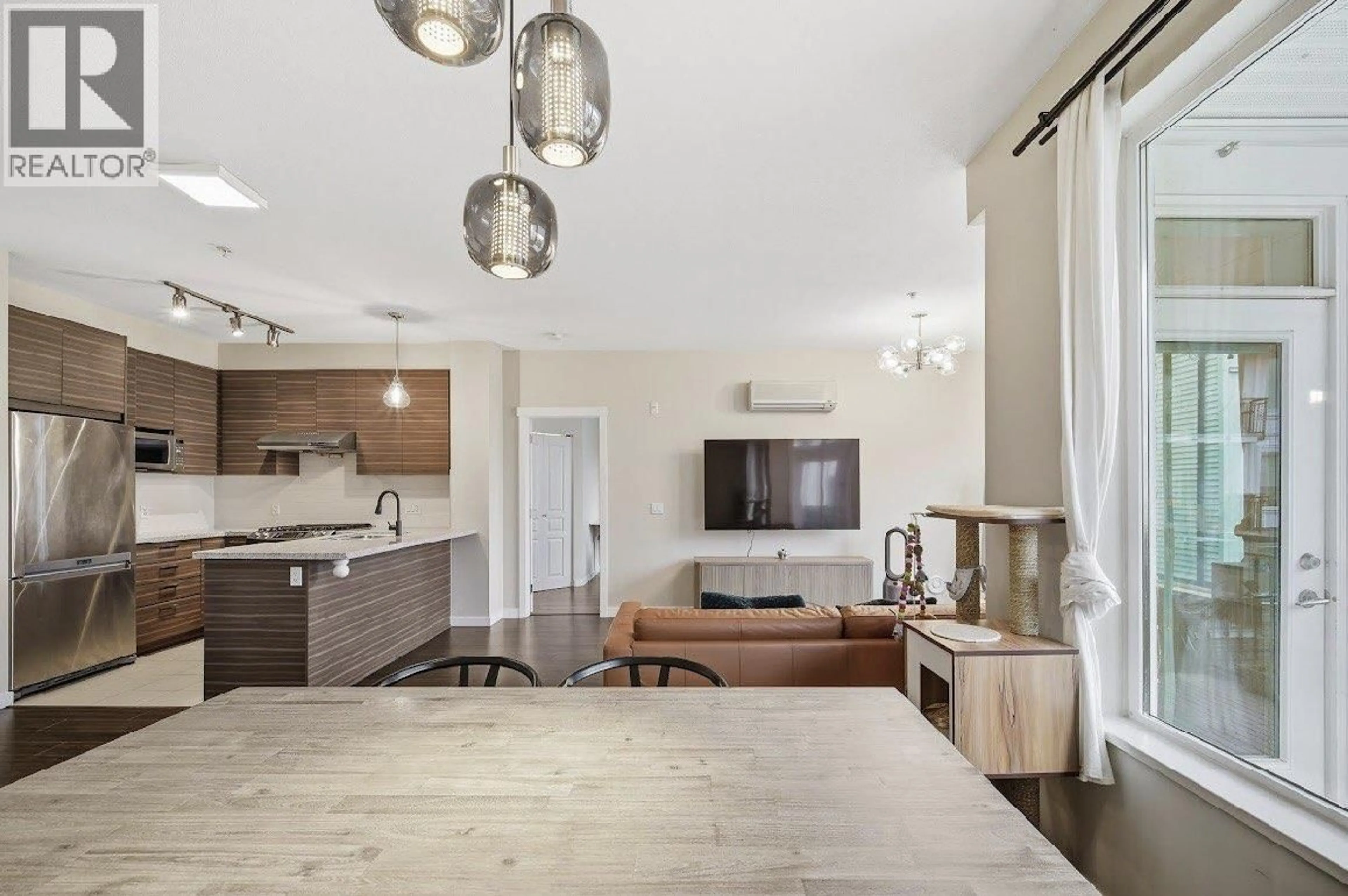 Open concept kitchen, unknown for 339 - 9388 MCKIM WAY, Richmond British Columbia V6X0J7