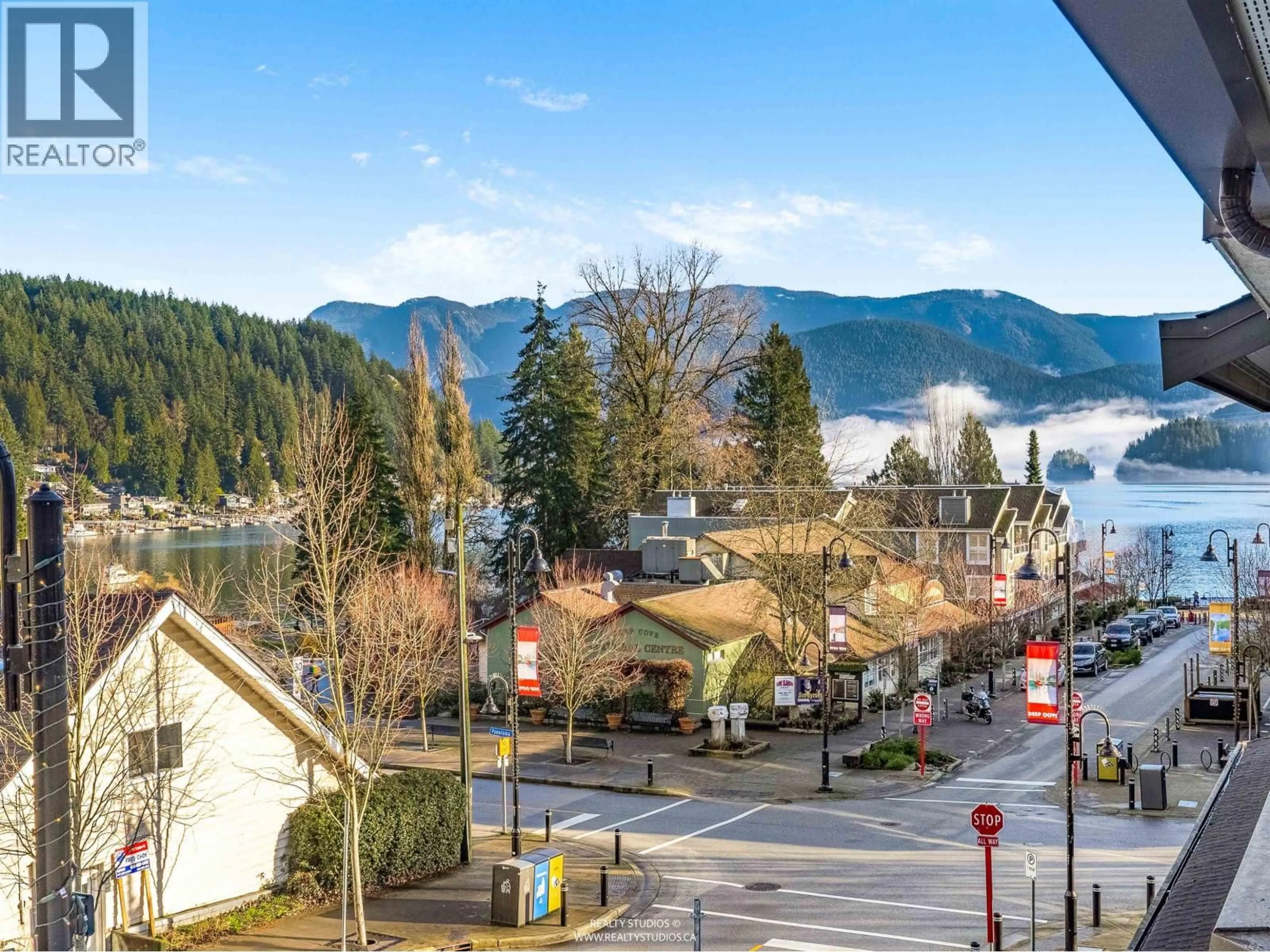 A pic from outside/outdoor area/front of a property/back of a property/a pic from drone, water/lake/river/ocean view for 203 - 4323 GALLANT AVENUE, North Vancouver British Columbia V7G2C1