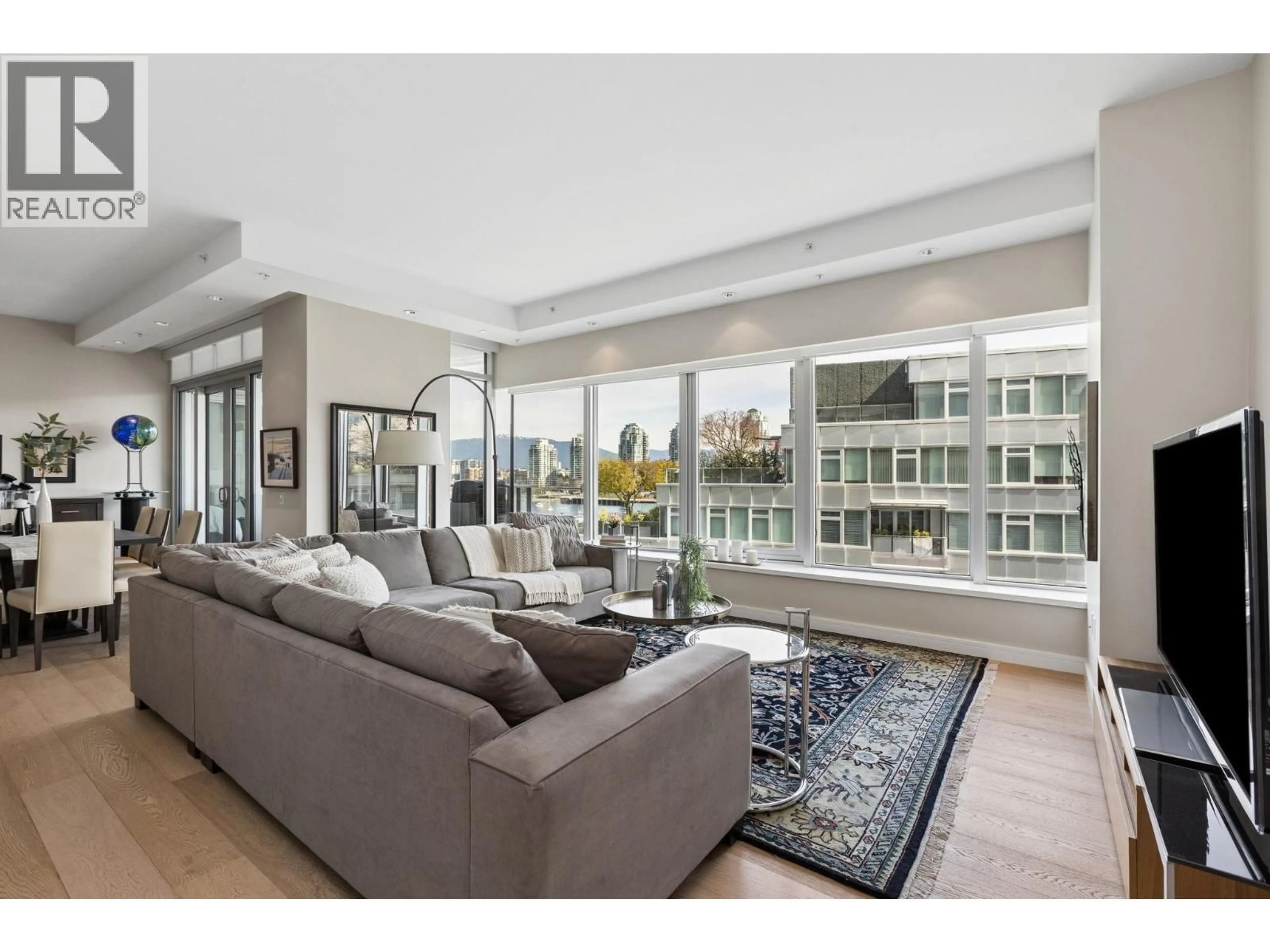 Living room with furniture, unknown for 603 - 181 ATHLETES WAY, Vancouver British Columbia V5Y0E5