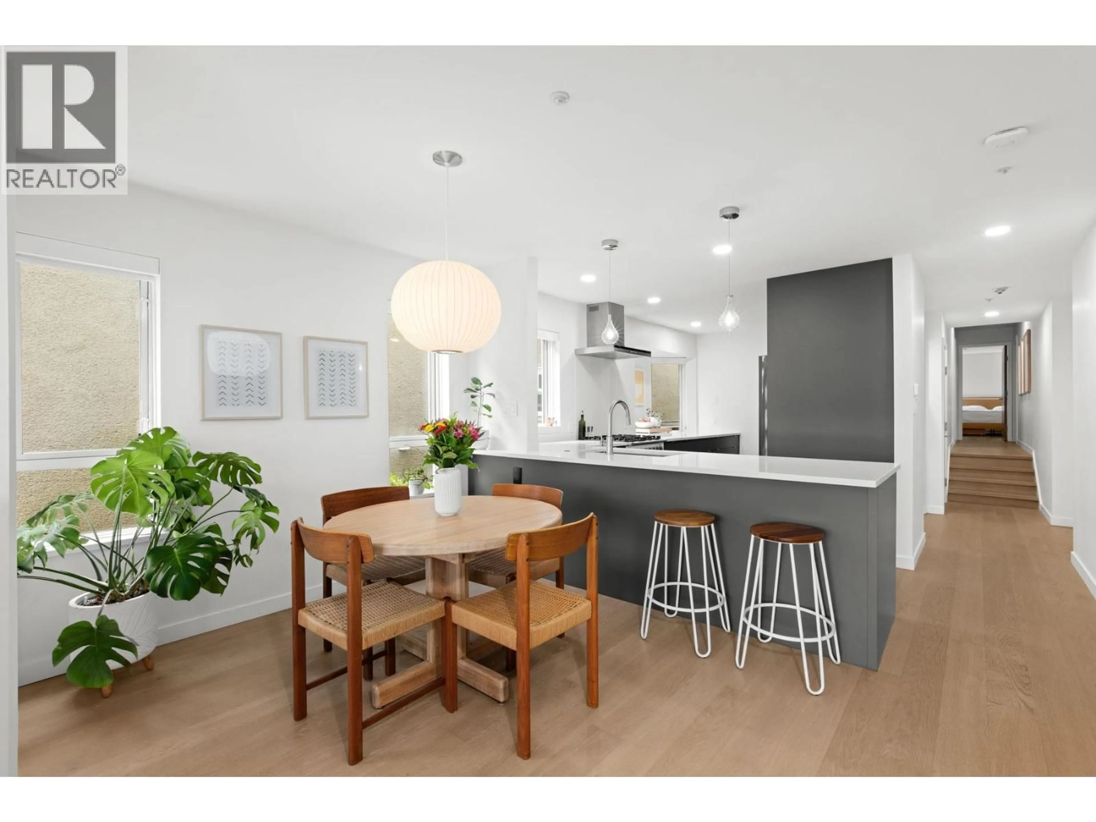 Open concept kitchen, wood/laminate floor for 201 - 2238 2ND AVENUE, Vancouver British Columbia V6K1H9