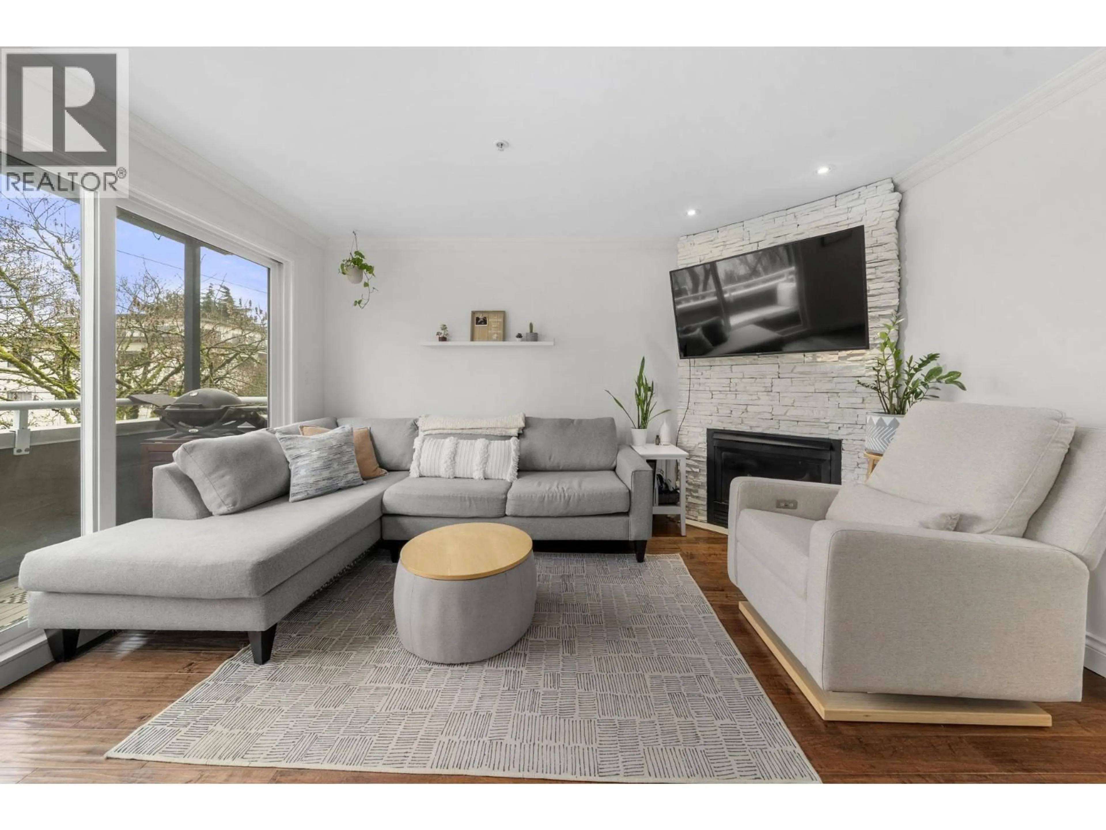 Living room with furniture, wood/laminate floor for 202 - 1106 11TH AVENUE, Vancouver British Columbia V6H1K3