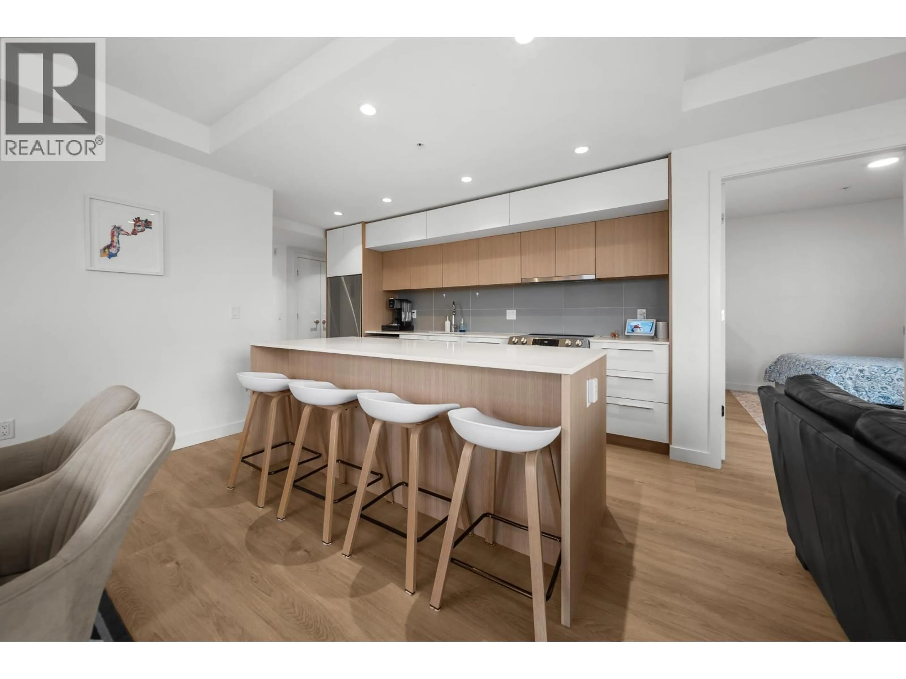 Open concept kitchen, wood/laminate floor for 305 - 9580 TOWER ROAD, Burnaby British Columbia V5A0G5