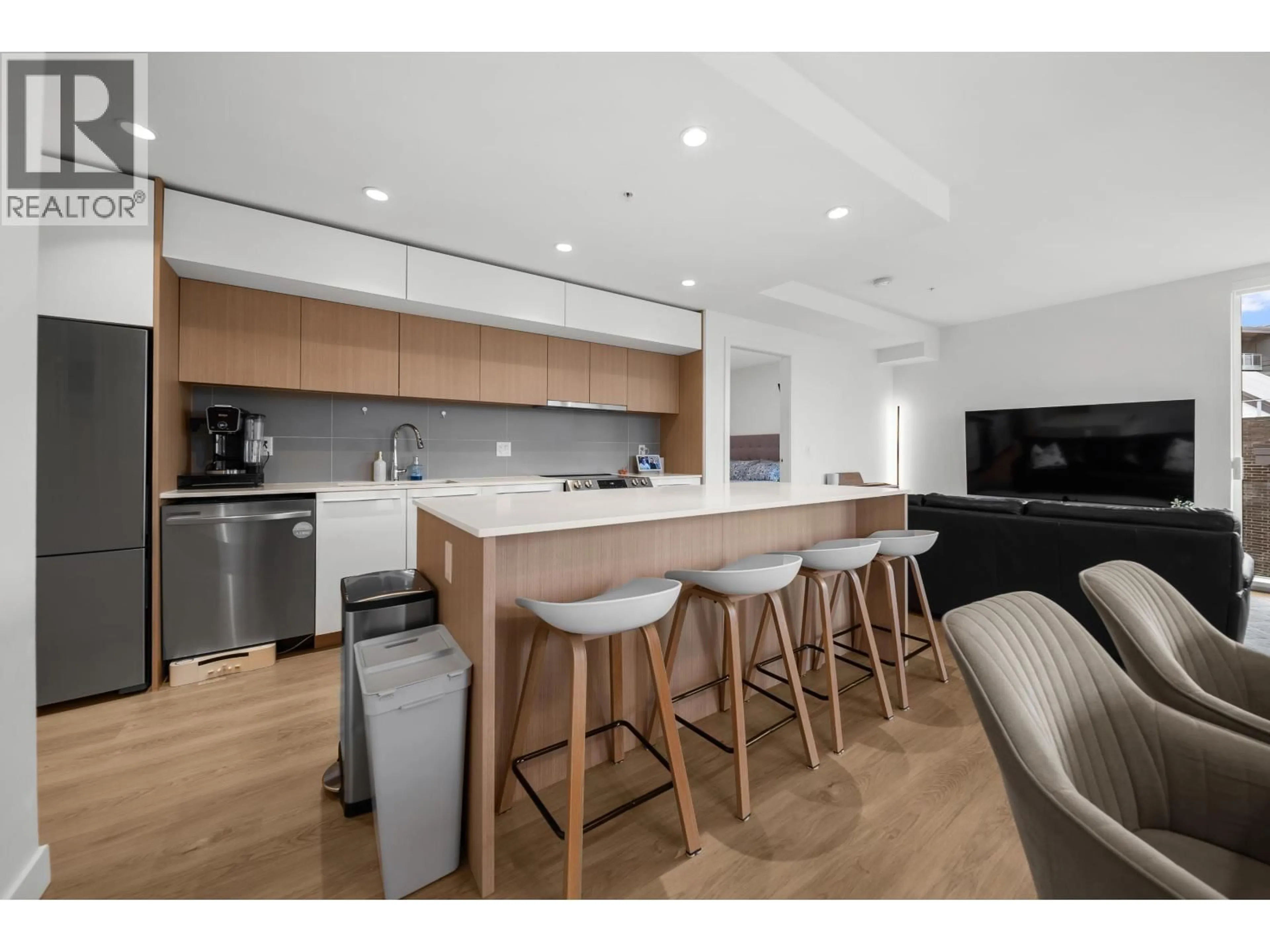 Open concept kitchen, wood/laminate floor for 305 - 9580 TOWER ROAD, Burnaby British Columbia V5A0G5