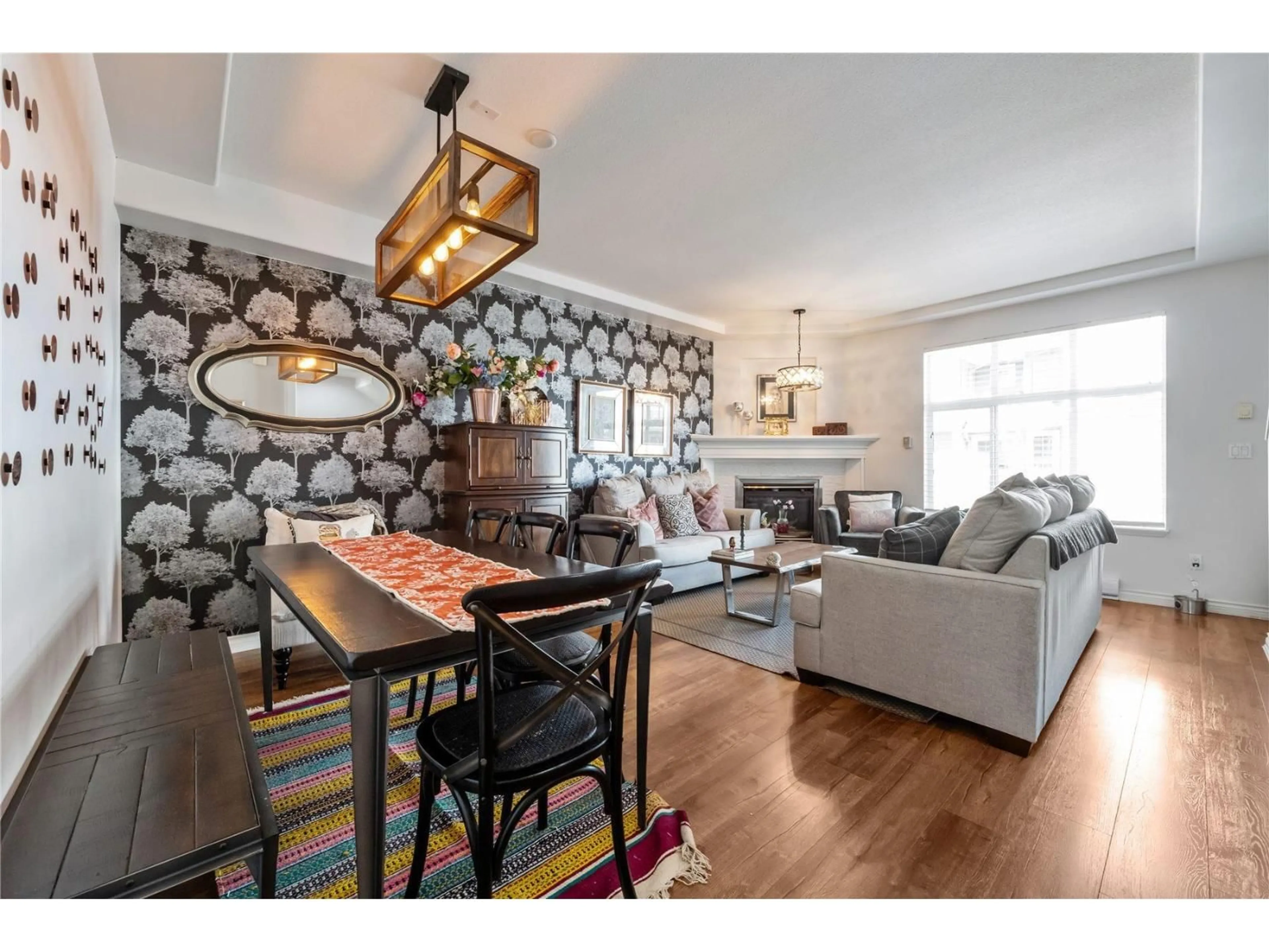 Living room with furniture, wood/laminate floor for 37 - 16760 61 AVENUE, Surrey British Columbia V3S3V3