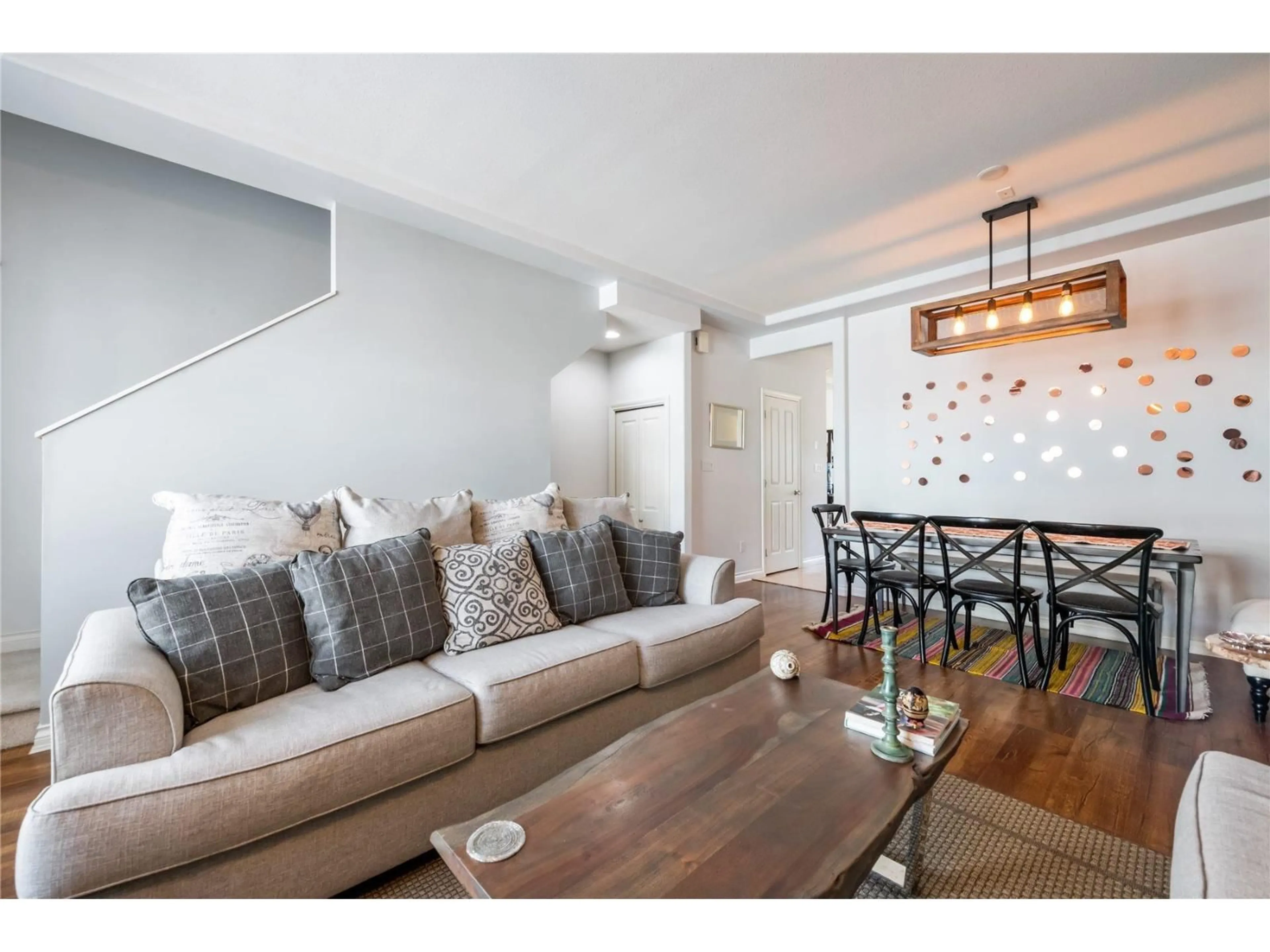 Living room with furniture, wood/laminate floor for 37 - 16760 61 AVENUE, Surrey British Columbia V3S3V3