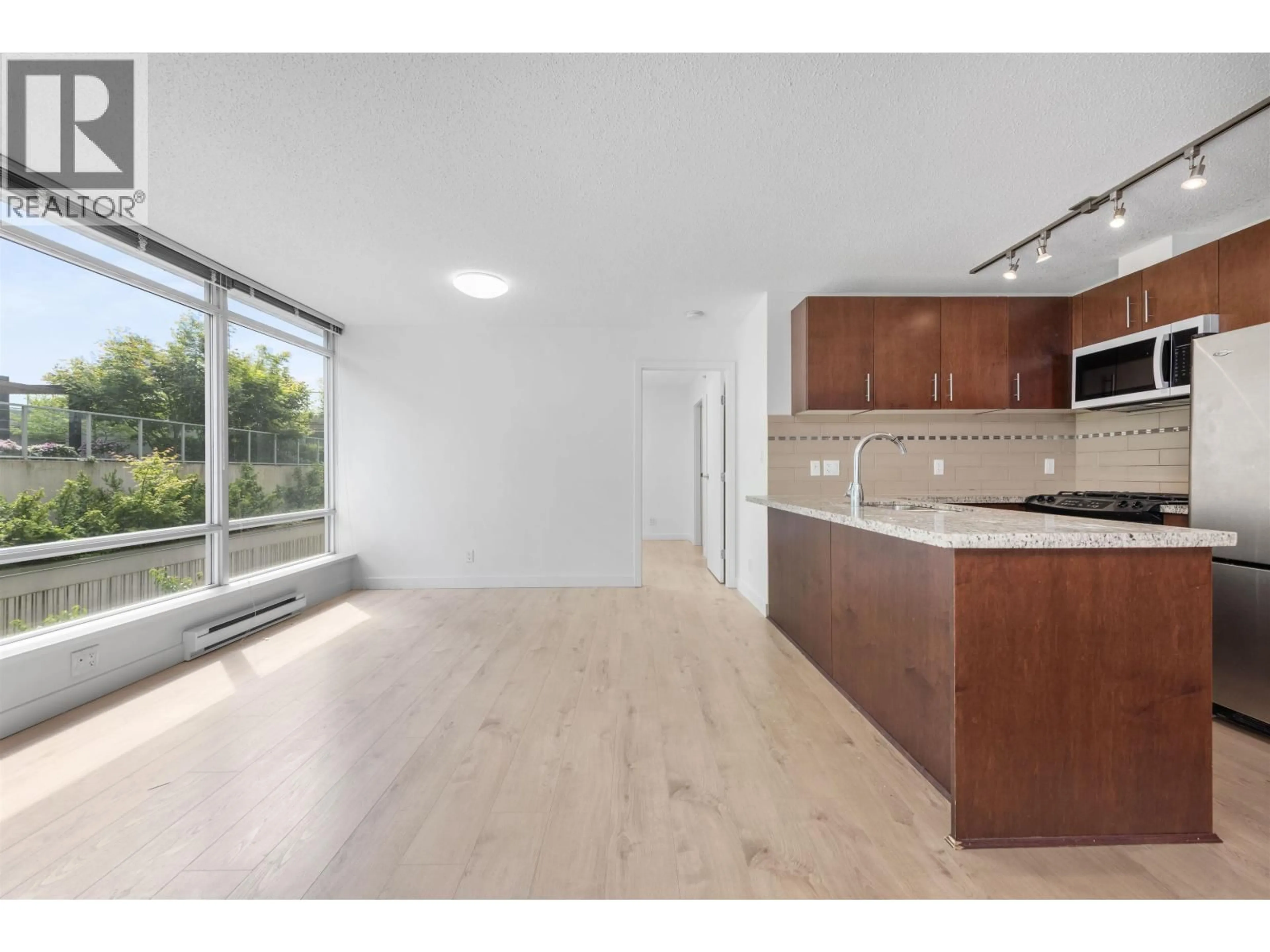 Open concept kitchen, unknown for 511 - 8280 LANSDOWNE ROAD, Richmond British Columbia V6X0B2