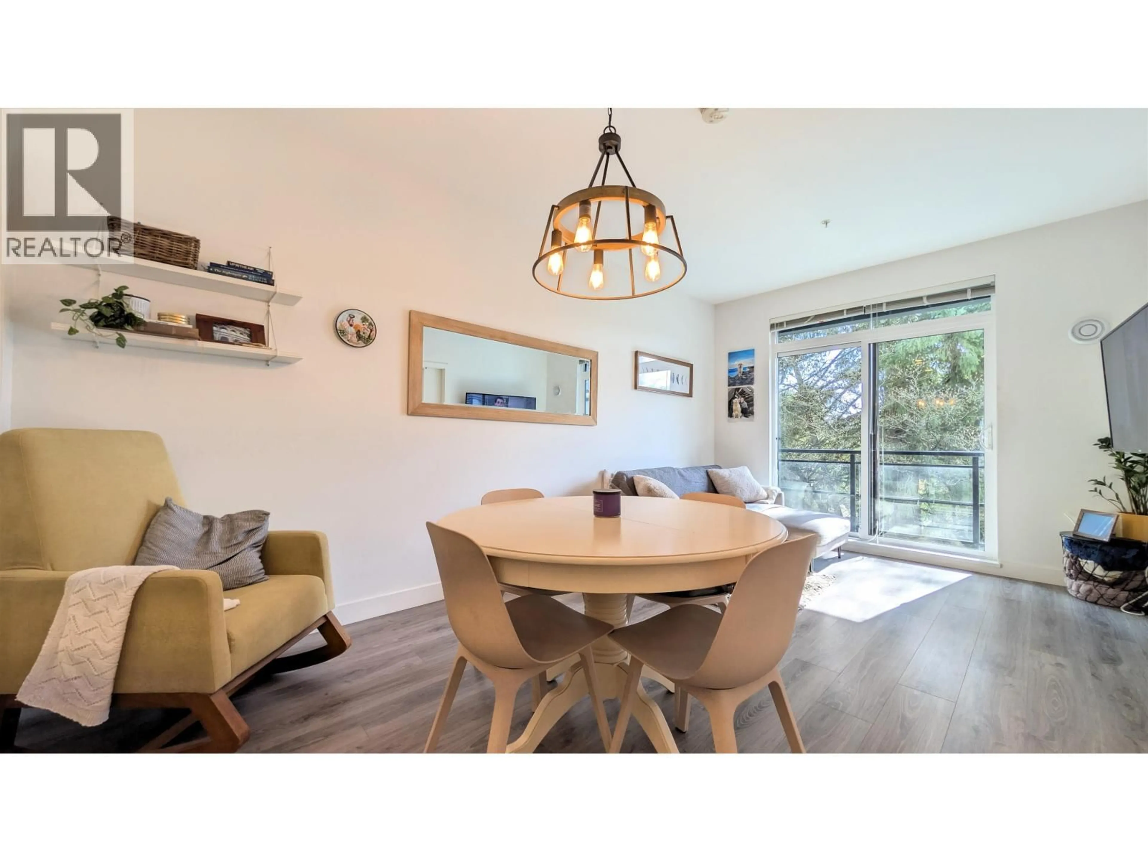 Dining room, wood/laminate floor for 402 - 700 CLARKE ROAD, Coquitlam British Columbia V3J0K5