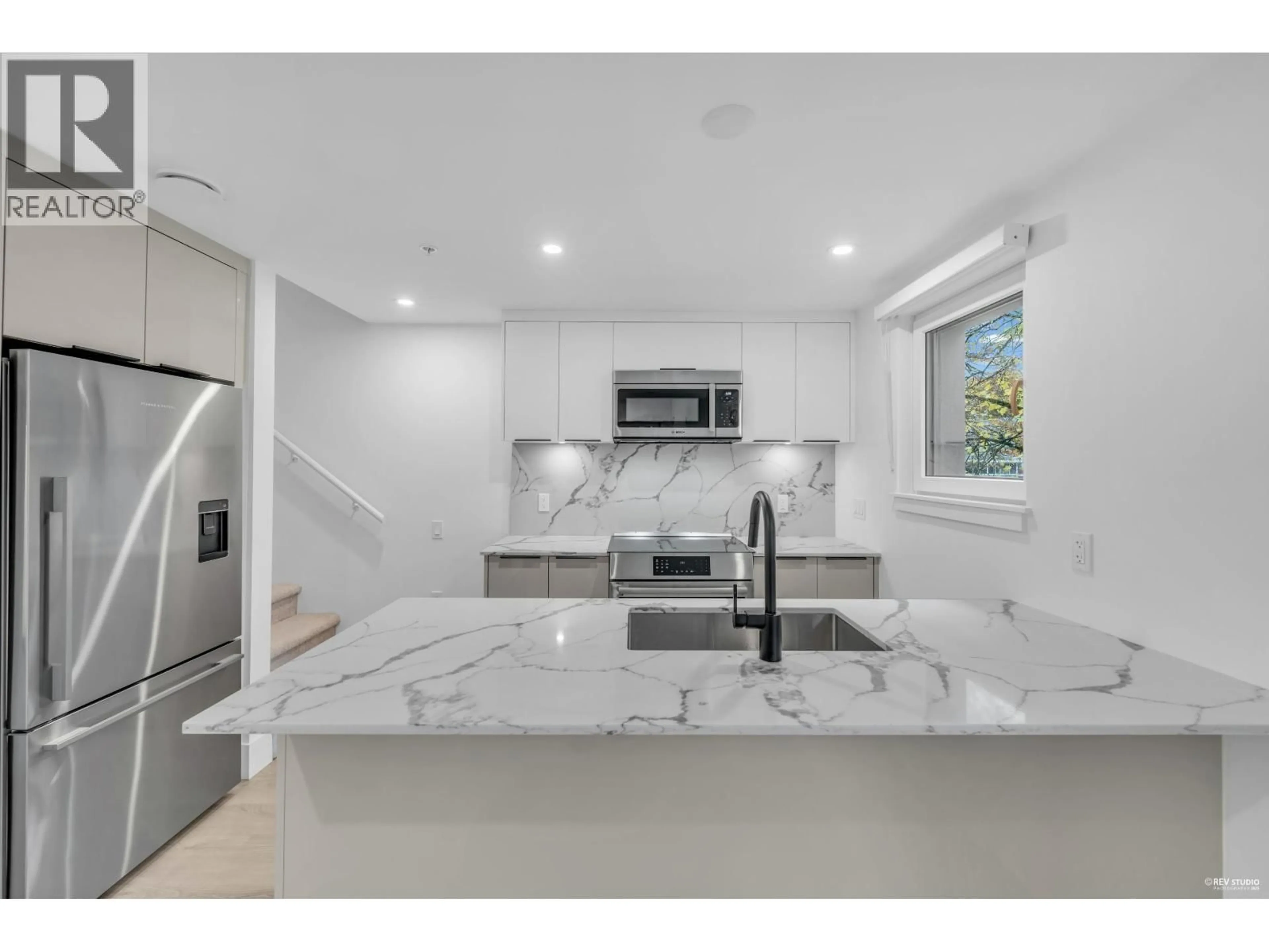 Open concept kitchen, ceramic/tile floor for 108 - 2073 1 AVENUE, Vancouver British Columbia V5N1B6