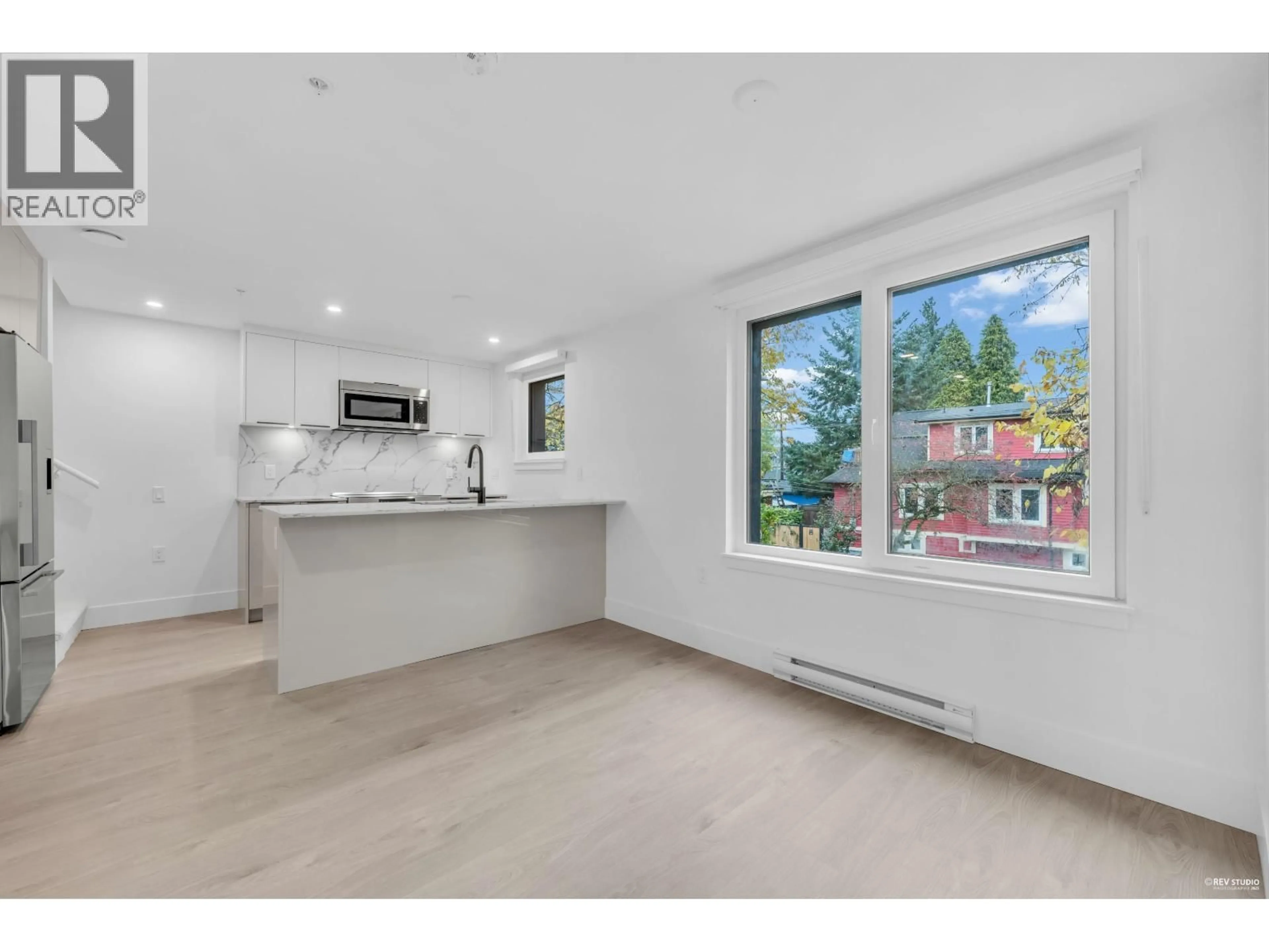 Open concept kitchen, unknown for 108 - 2073 1 AVENUE, Vancouver British Columbia V5N1B6