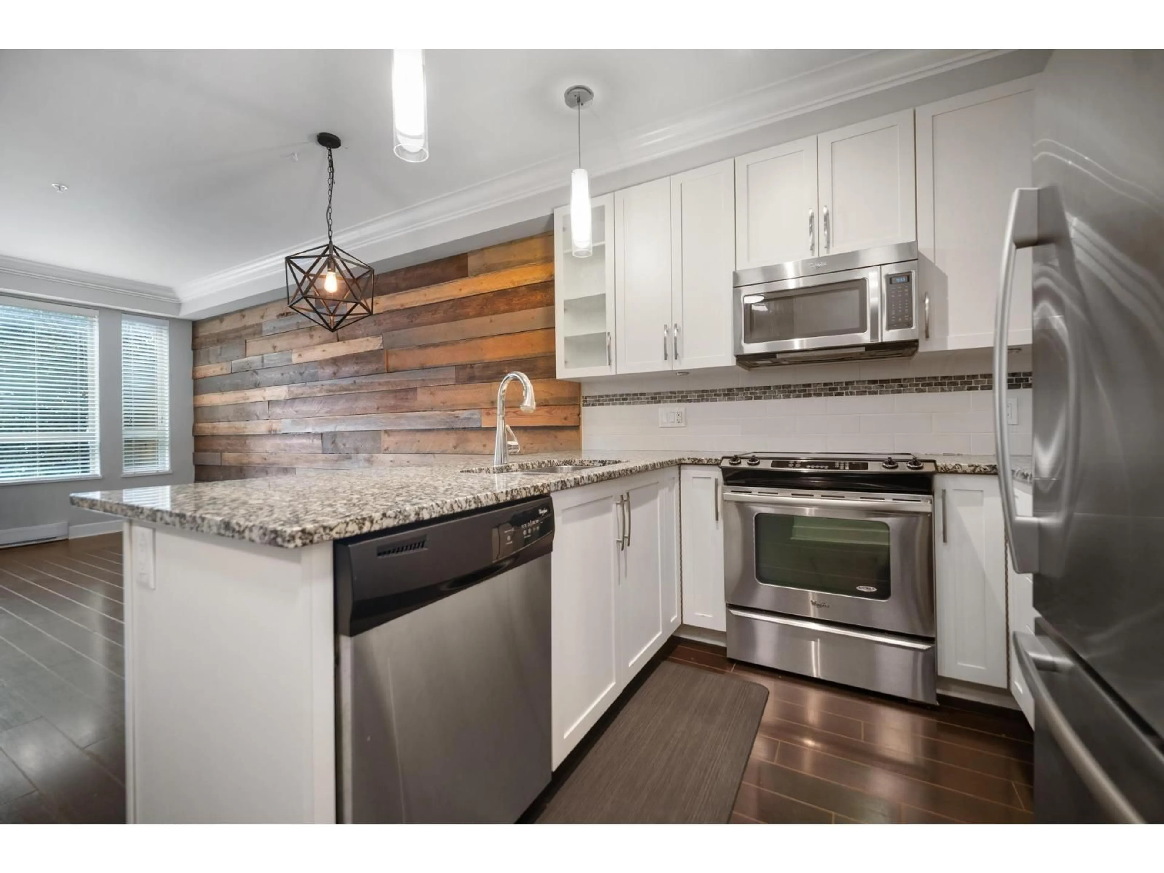 Open concept kitchen, wood/laminate floor for 119 - 20861 83 AVENUE, Langley British Columbia V2Y0M8