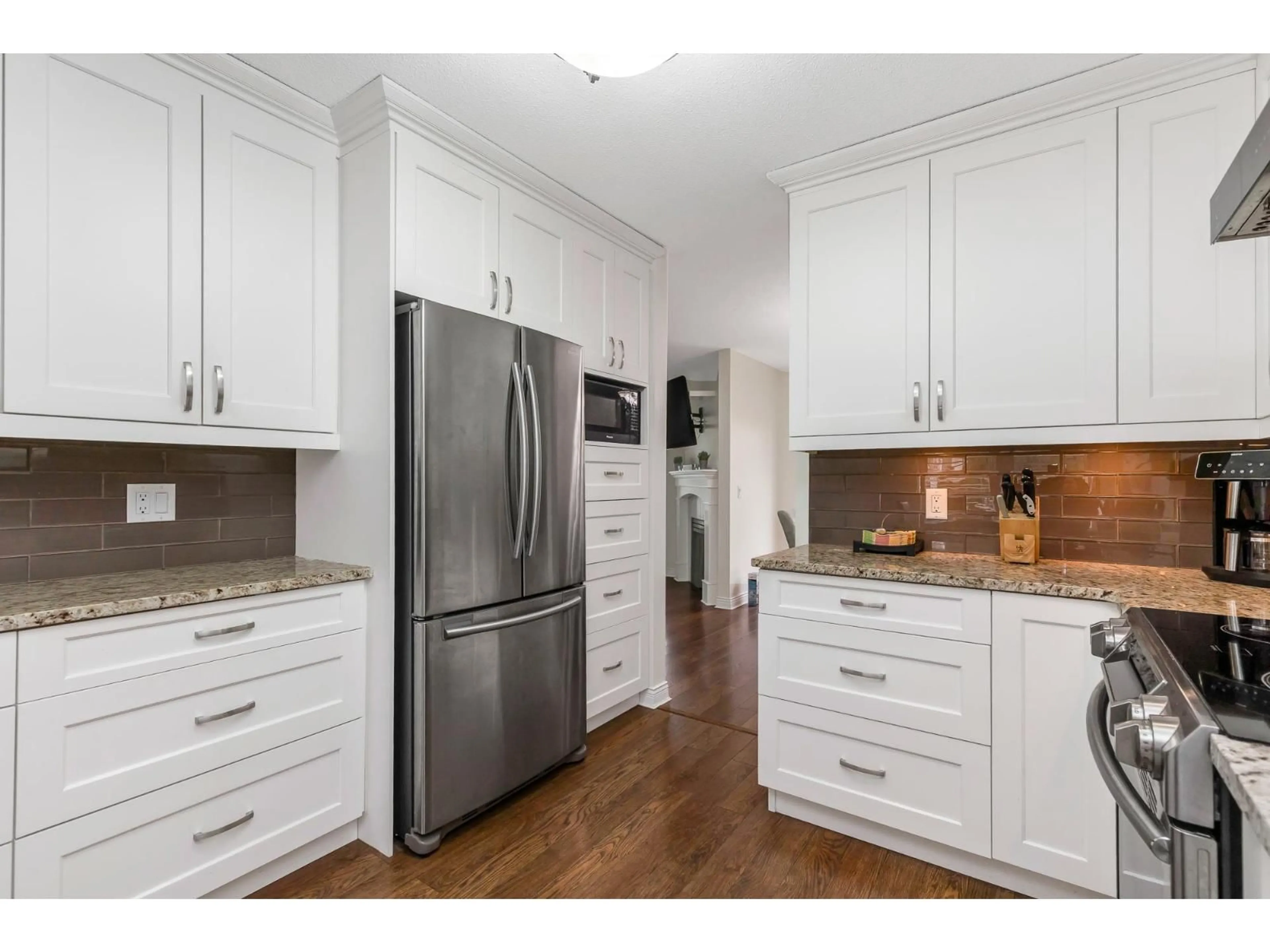 Open concept kitchen, wood/laminate floor for 39 - 21928 48 AVENUE, Langley British Columbia V3A8H1