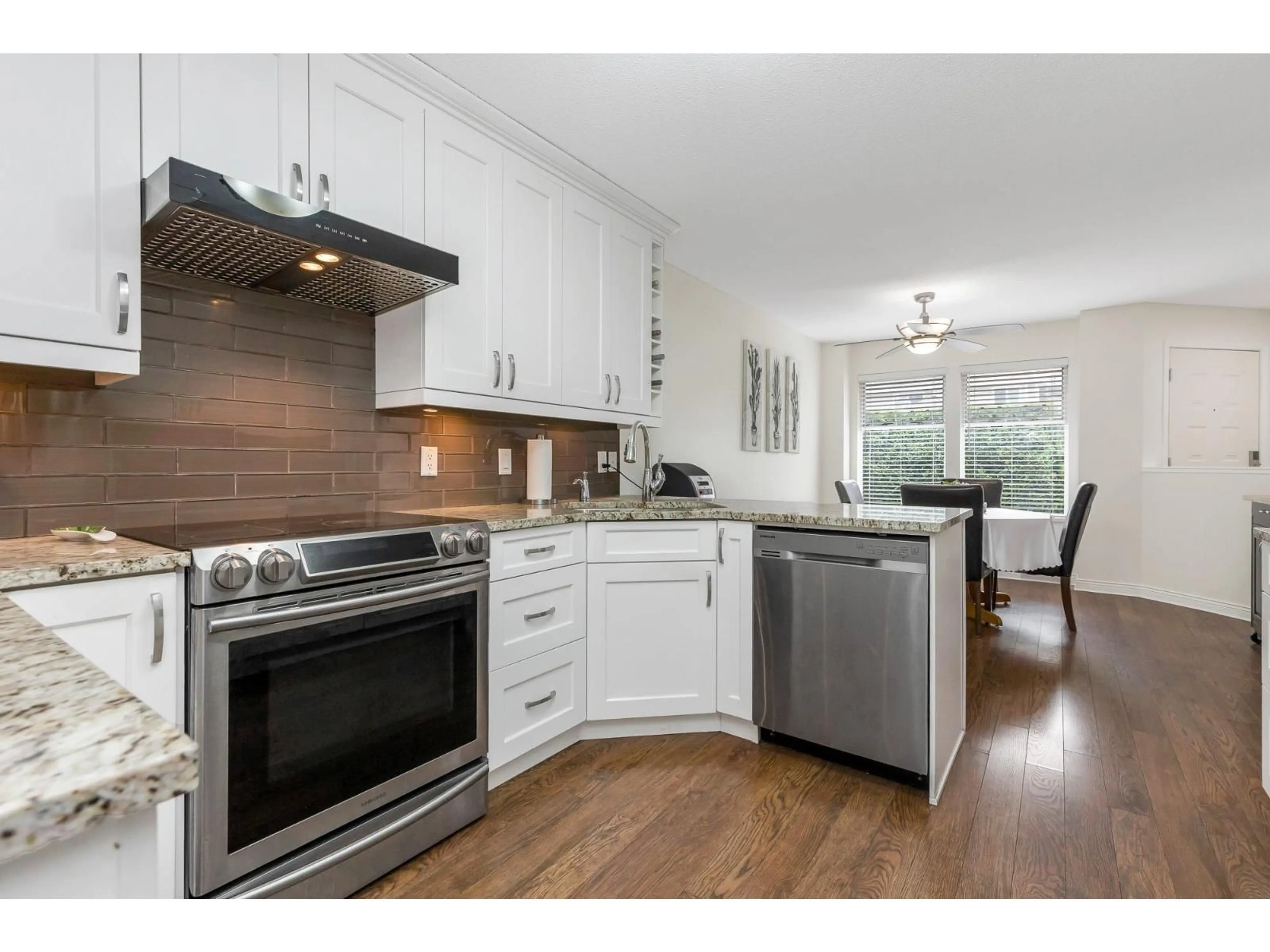 Open concept kitchen, unknown for 39 - 21928 48 AVENUE, Langley British Columbia V3A8H1