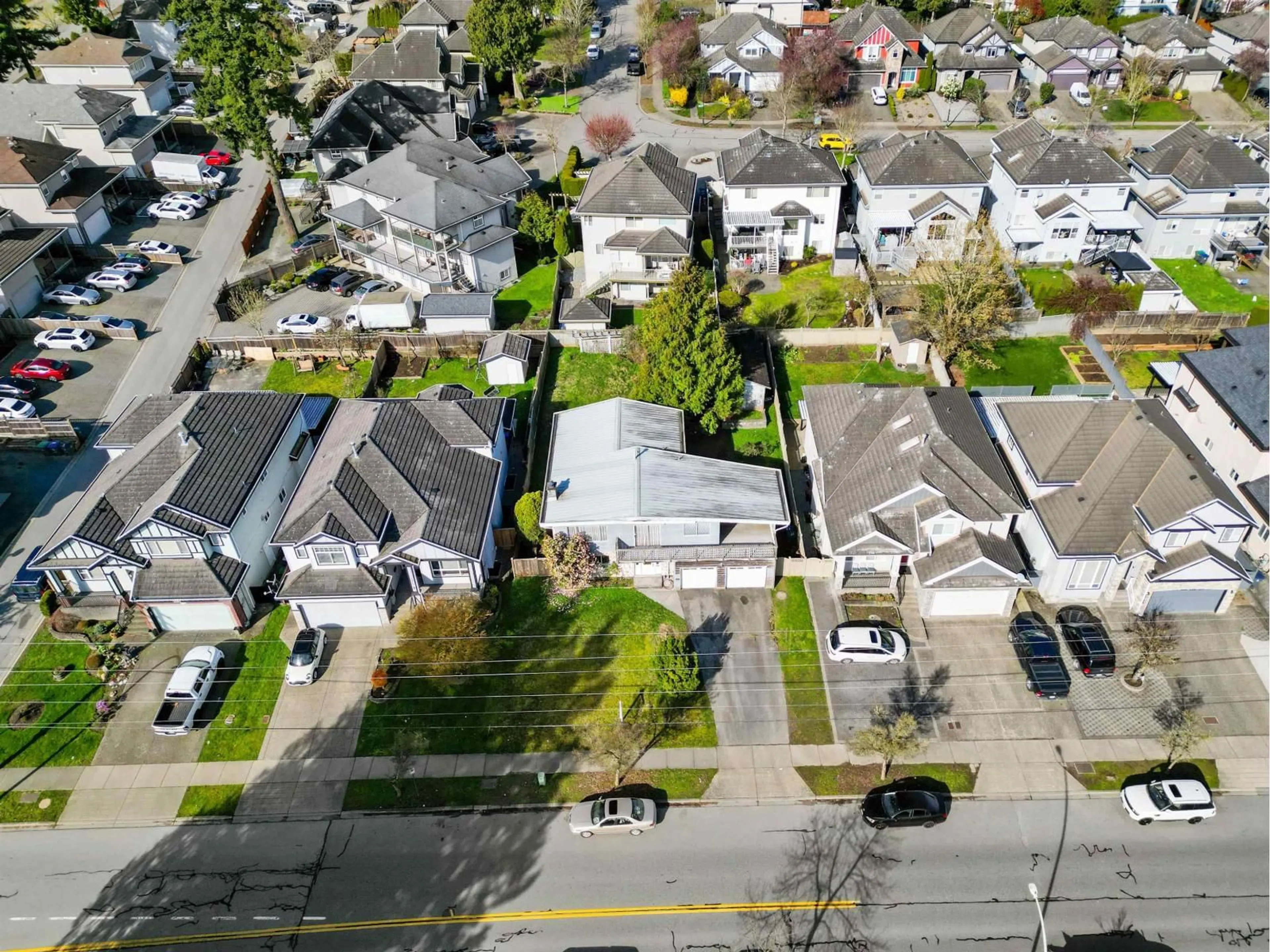 A pic from outside/outdoor area/front of a property/back of a property/a pic from drone, street for 7257 148 STREET, Surrey British Columbia V3S4S5