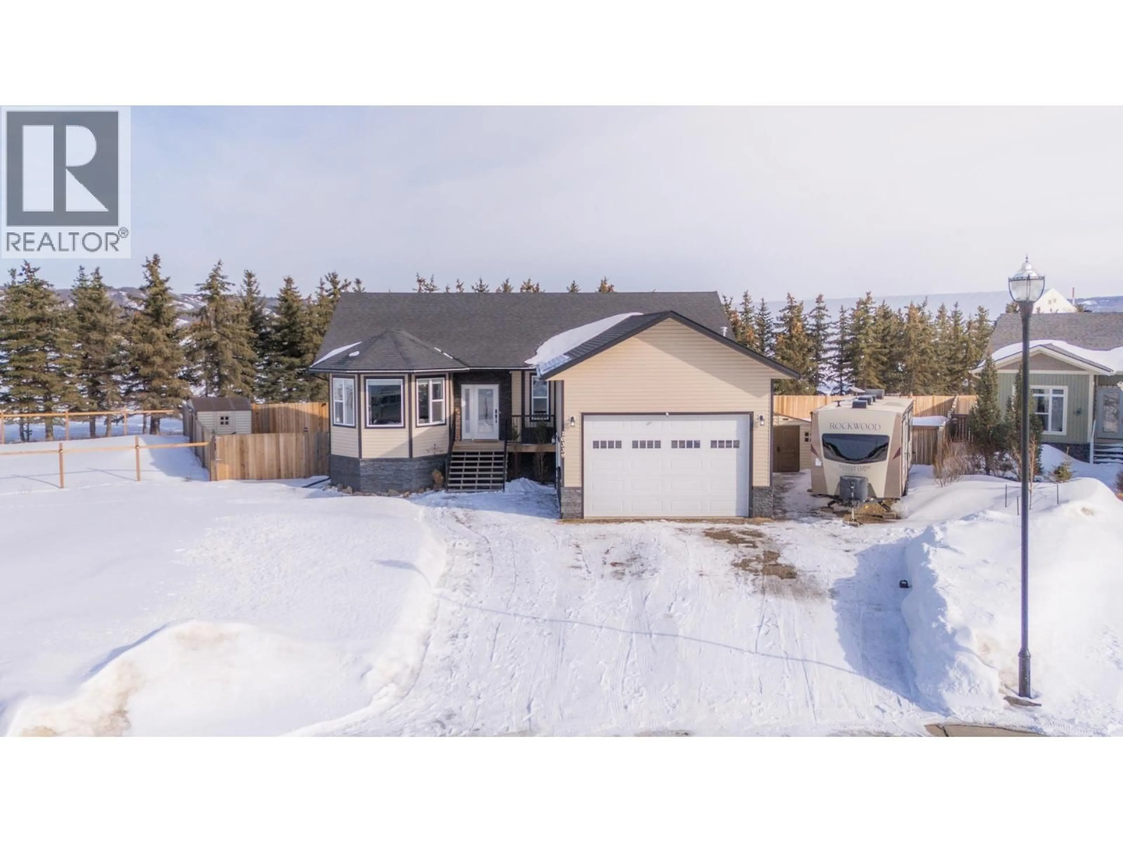 A pic from outside/outdoor area/front of a property/back of a property/a pic from drone, street for 10339 97 STREET, Taylor British Columbia V0C2K0